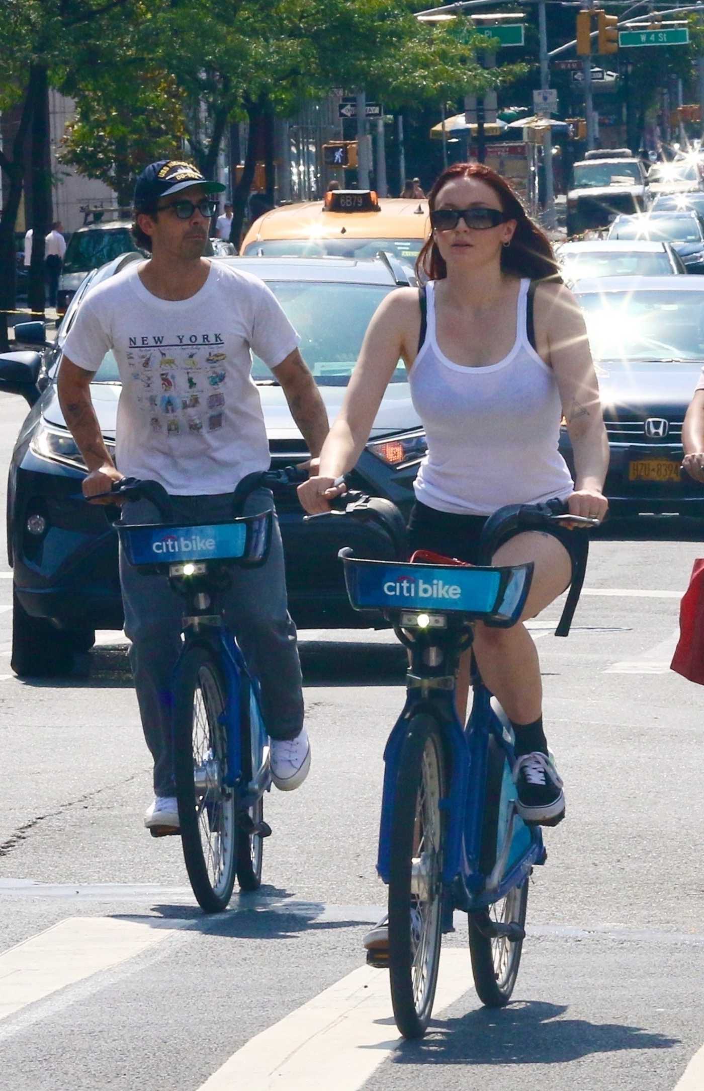 Sophie Turner in a White Tank Top Does a Bike Ride Out with Joe Jonas in Manhattan’s Downtown Area in NYC 09/05/2022
