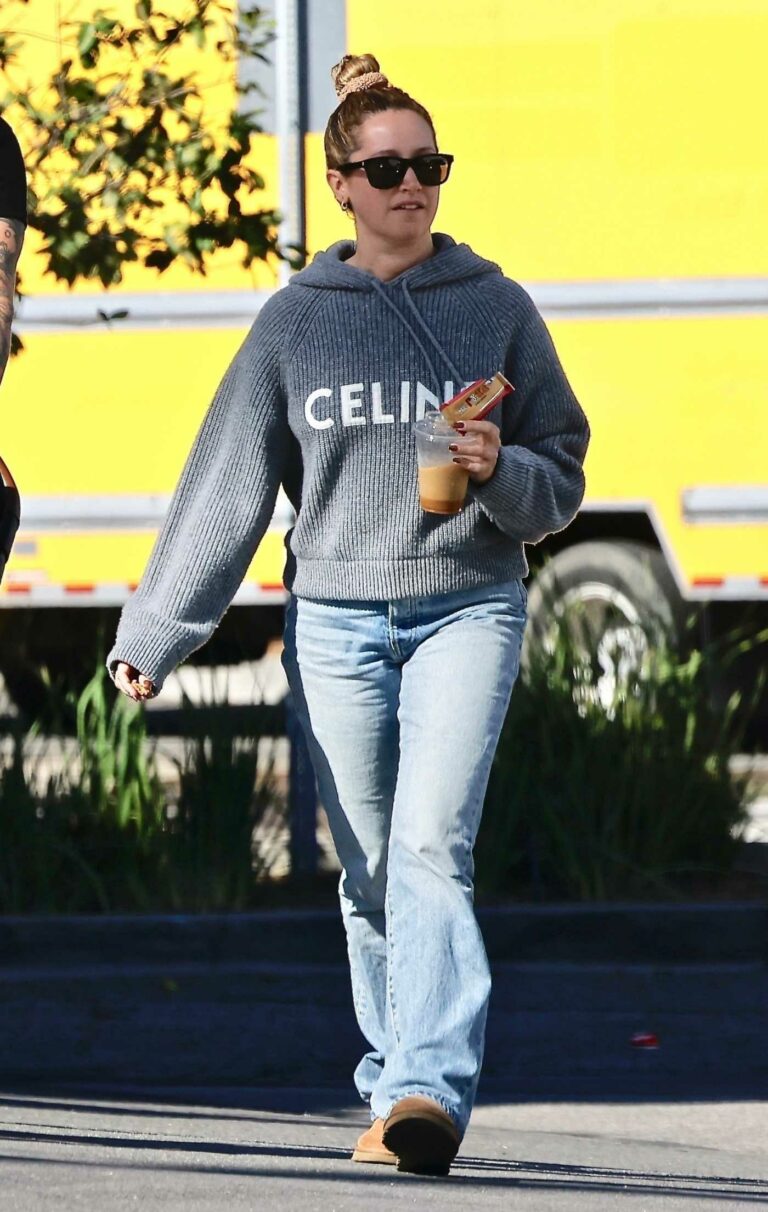 Ashley Tisdale in a Grey Knitted Hoodie