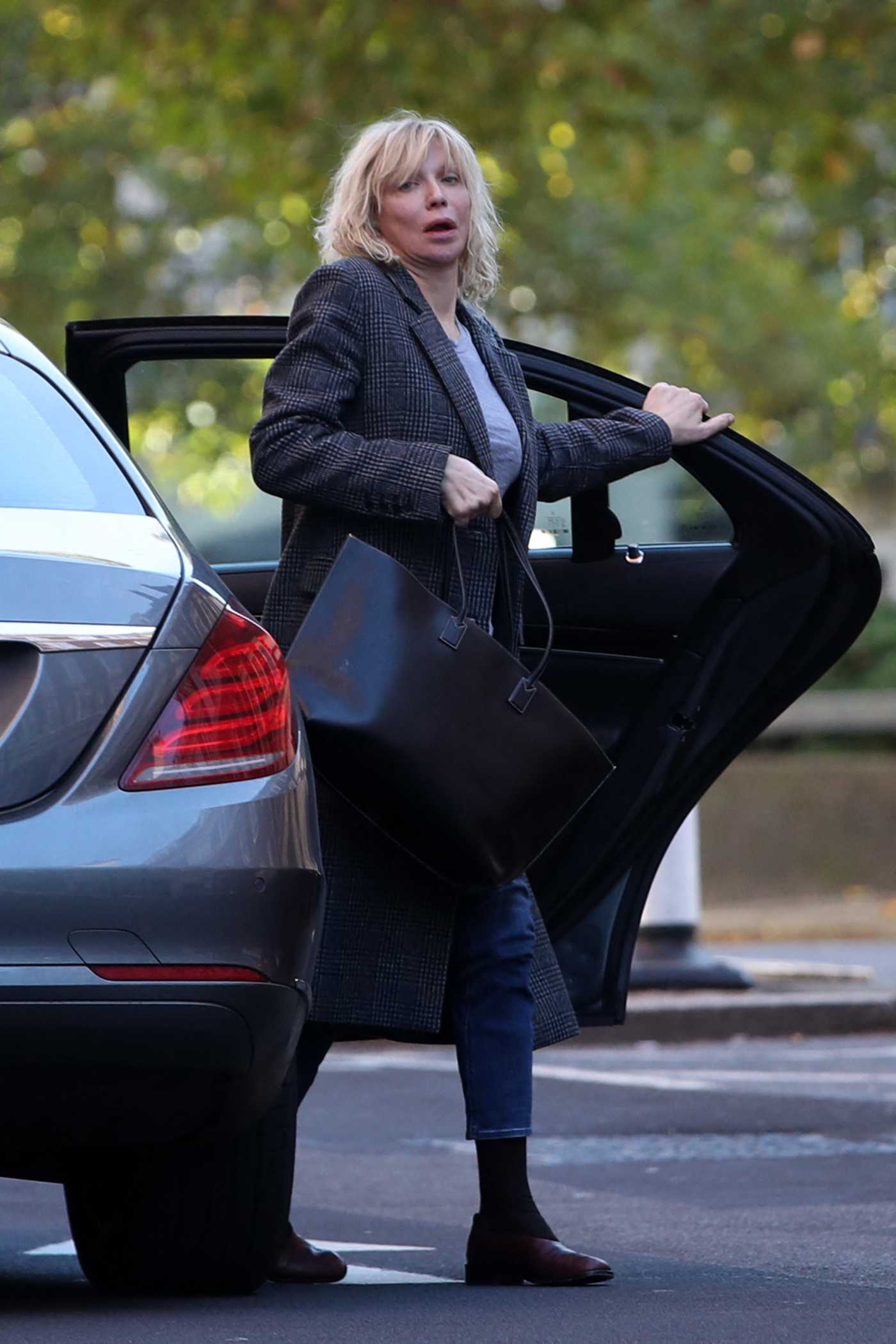 Courtney Love in a Grey Coat Was Seen Out in Central London 10/18/2022