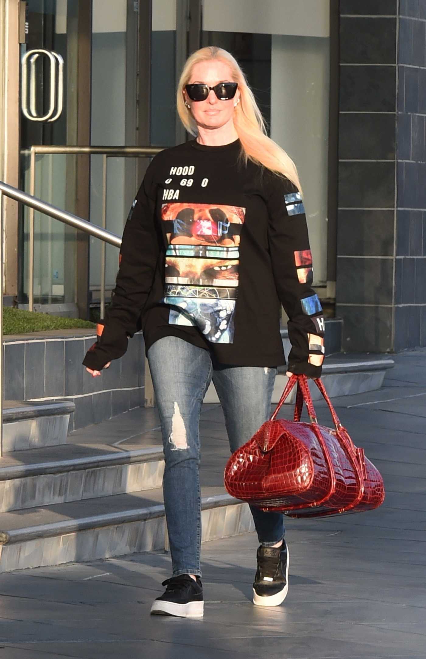 Erika Jayne in a Black Sneakers Leaves a Med Spa in West Hollywood 10/07/2022