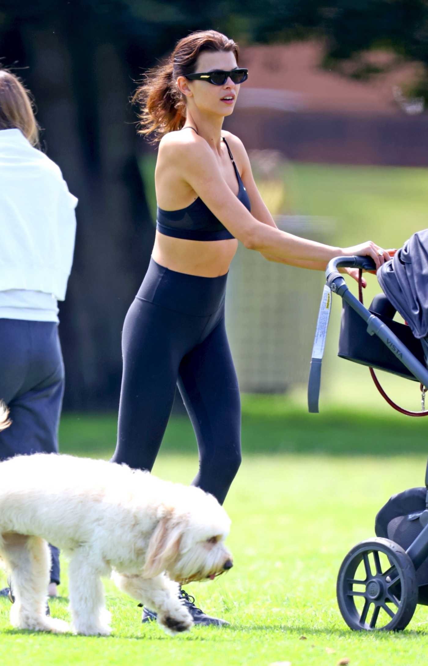 Georgia Fowler in a Black Sports Bra Goes for a Morning Walk with Her Baby and Dog in Sydney 10/04/2022