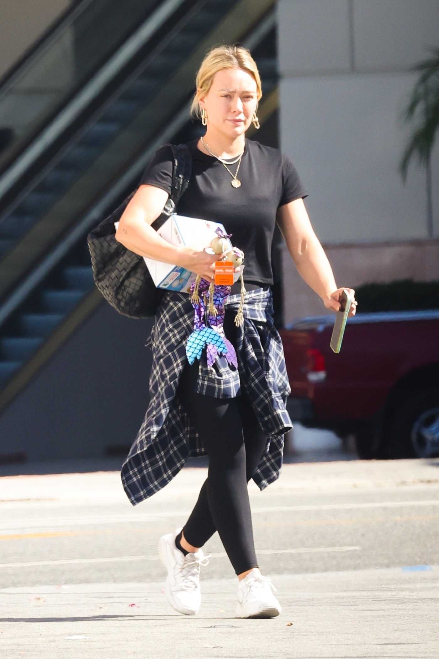 Hilary Duff in a Black Tee Leaves Her Local CVS in Studio City 10/23/2022
