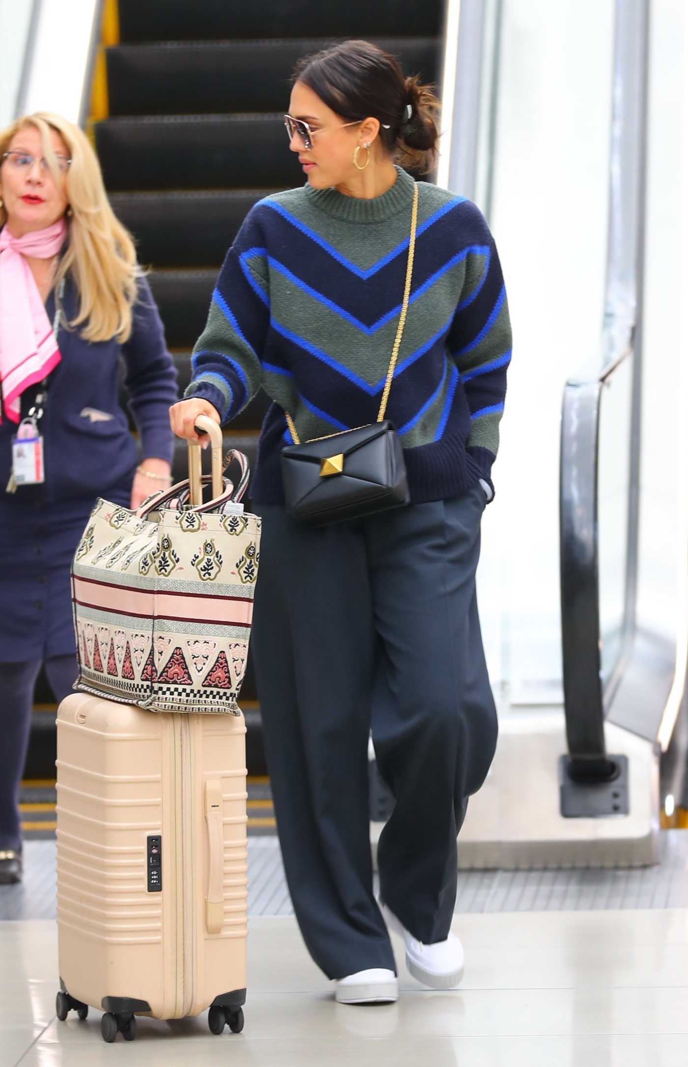 Jessica Alba in a White Sneakers Arrives to Laguardia Airport in New York 10/15/2022