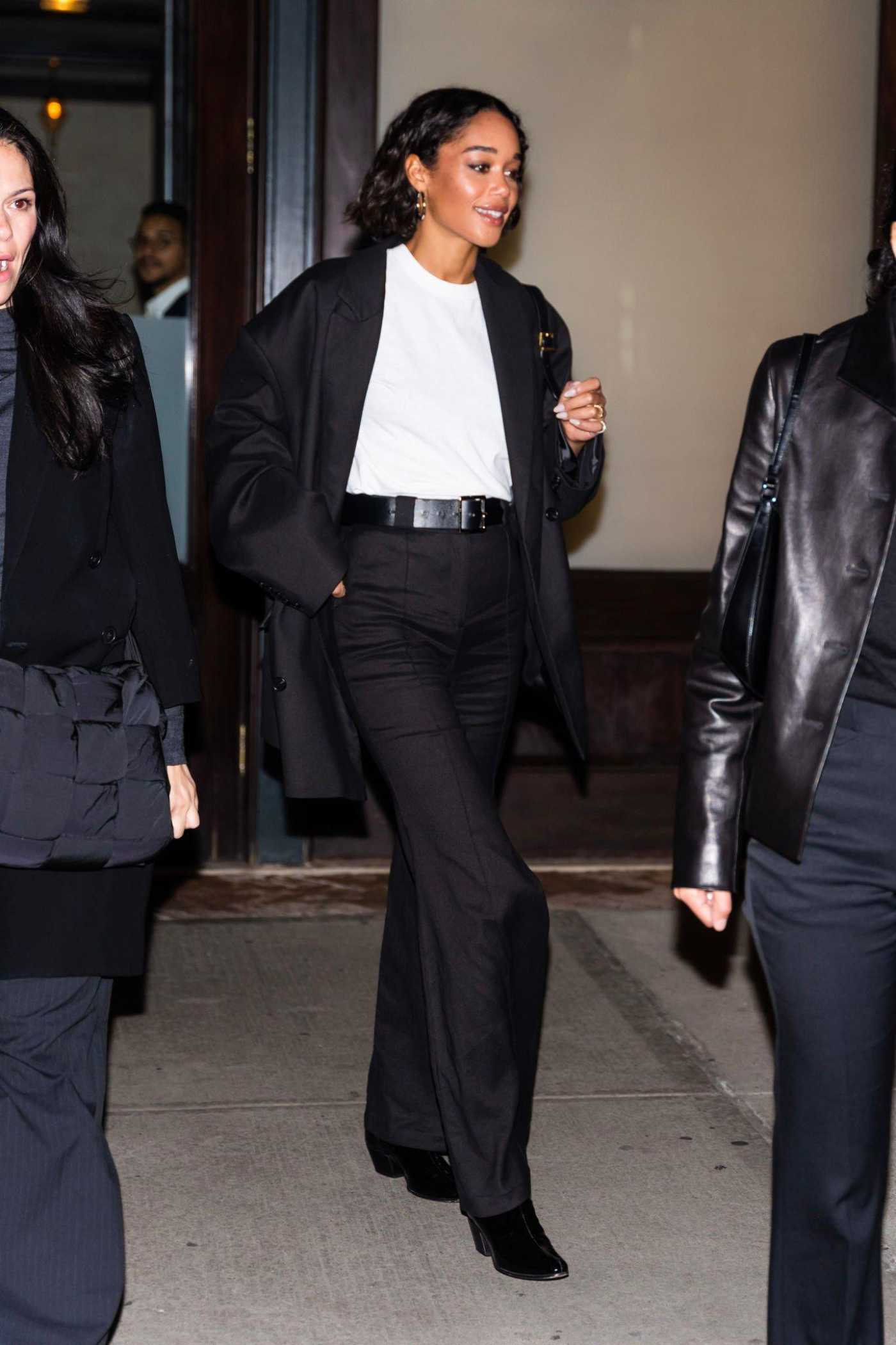 Laura Harrier in a Black Pantsuit Leaves Her Hotel in Tribeca in New York City 10/20/2022