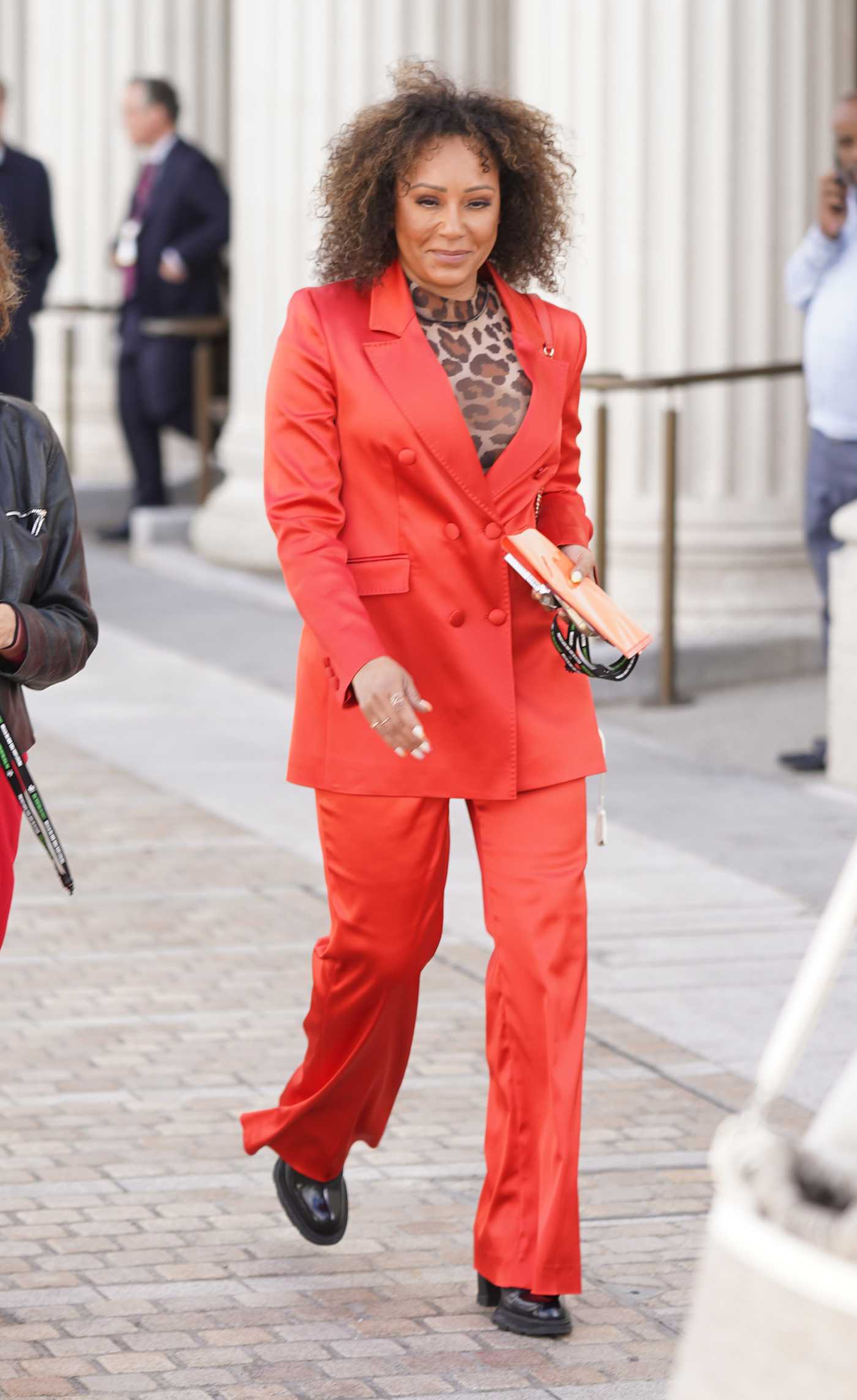 Melanie Brown in a Red Pantsuit Arrives at the Conservative Party Conference in Birmingham 10/02/2022