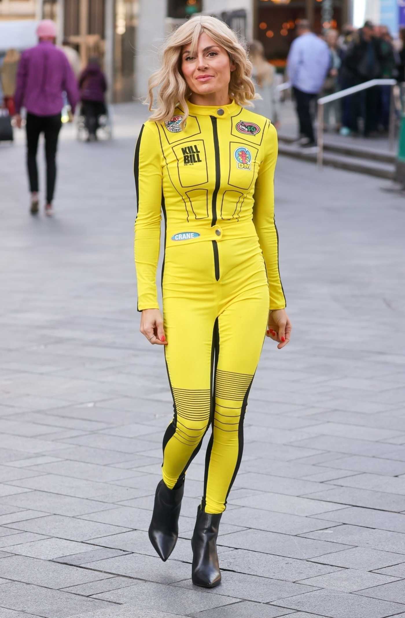 Zoe Hardman in a Yellow Catsuit Arrives at the Global Radio in London 10/07/2022