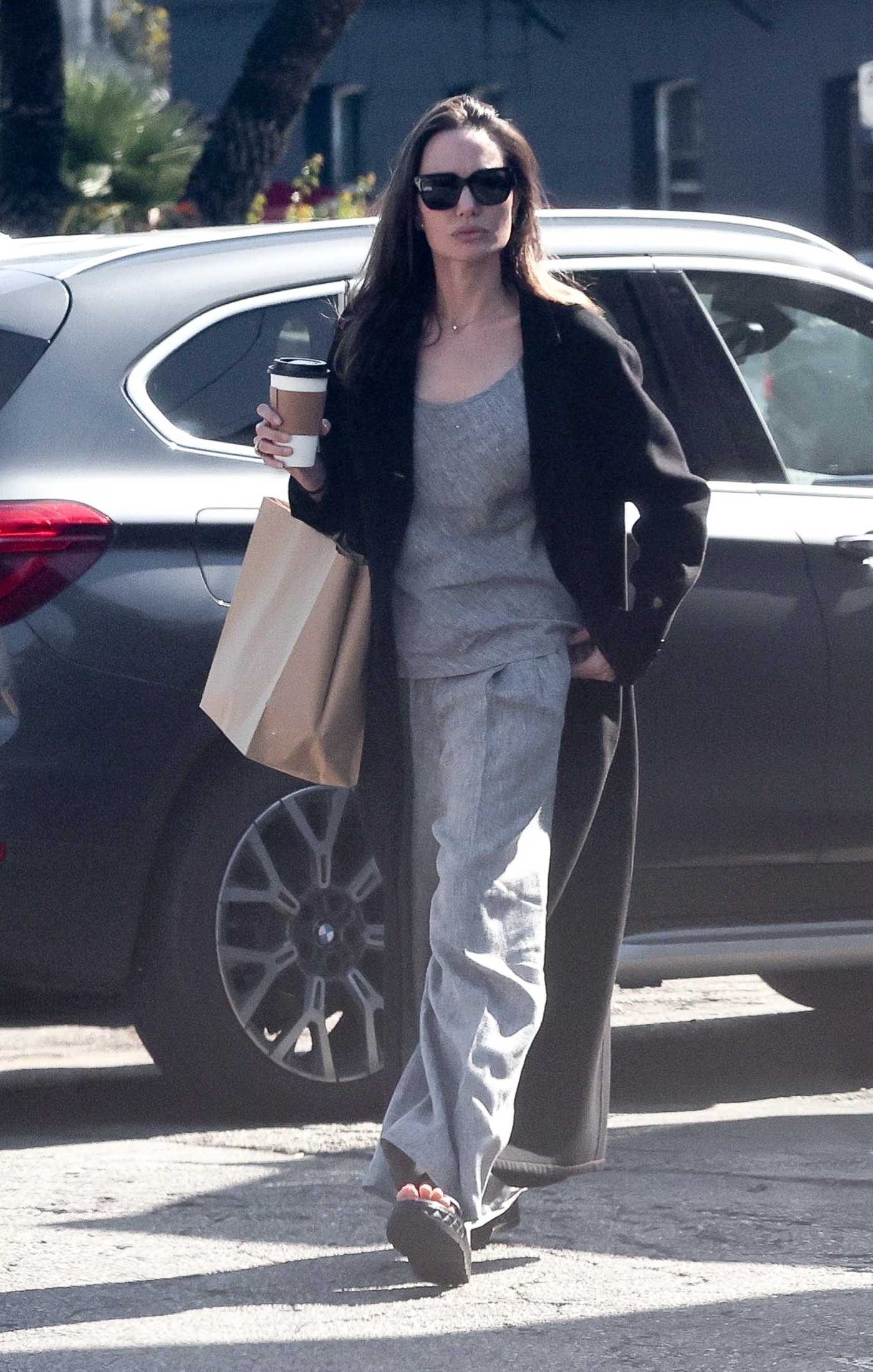 Angelina Jolie in a Black Coat Goes Shopping for Groceries in Los Feliz 10/29/2022