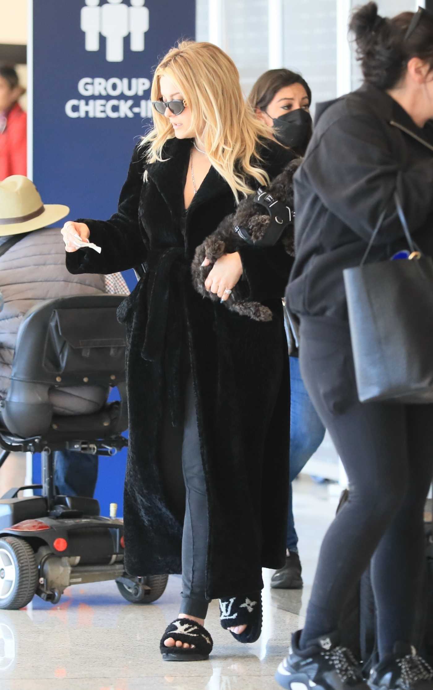 Bebe Rexha in a Black Fur Coat Arrives at LAX Airport in Los Angeles 11/22/2022