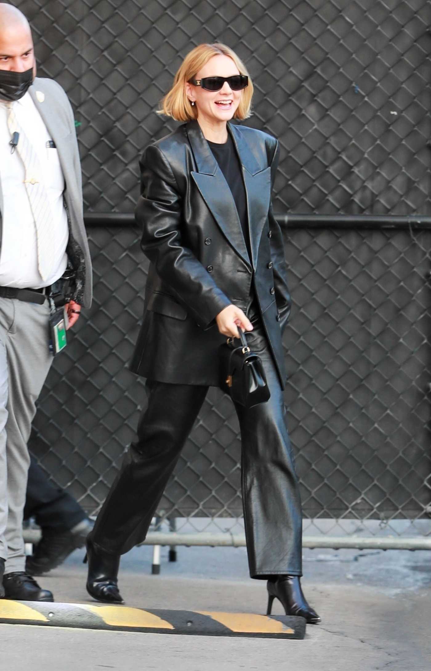 Carey Mulligan in a Black Leather Pantsuit Arrives at the El Capitan Entertainment Centre in Hollywood 11/21/2022