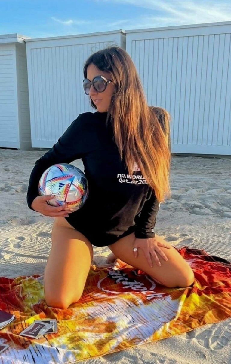 Claudia Romani in a Black World Cup Long Sleeve Shirt