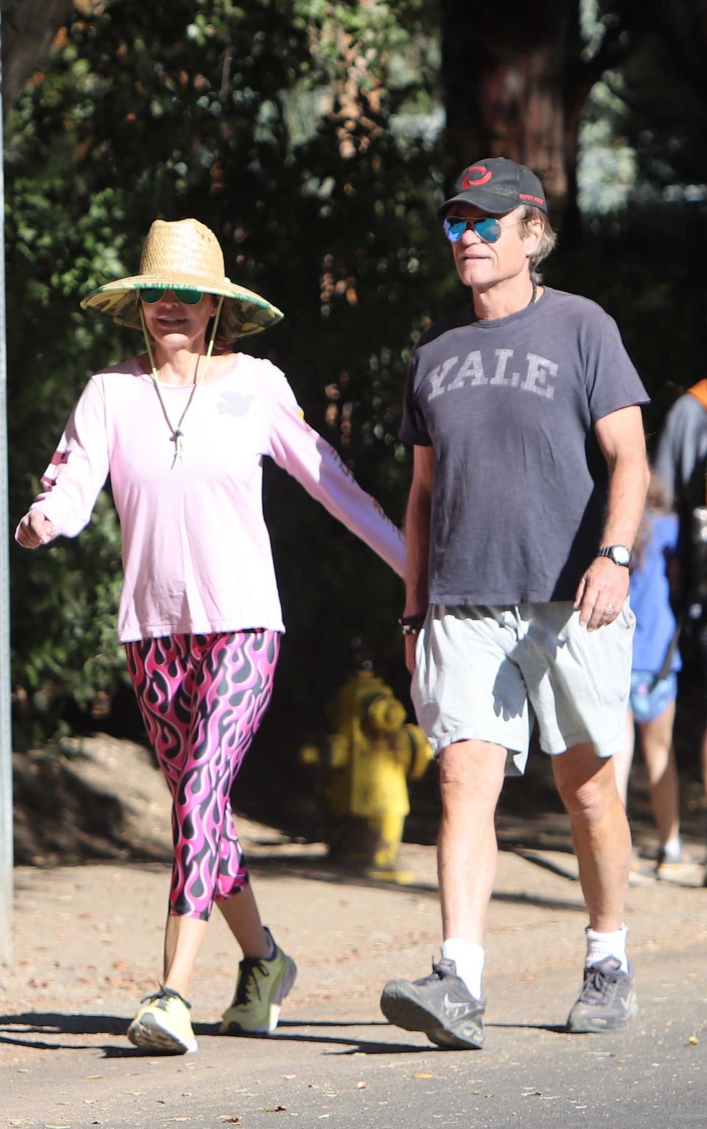 Lisa Rinna in a Pink Long Sleeves T-Shirt Was Seen Out with Harry Hamlin in Studio City 10/30/2022