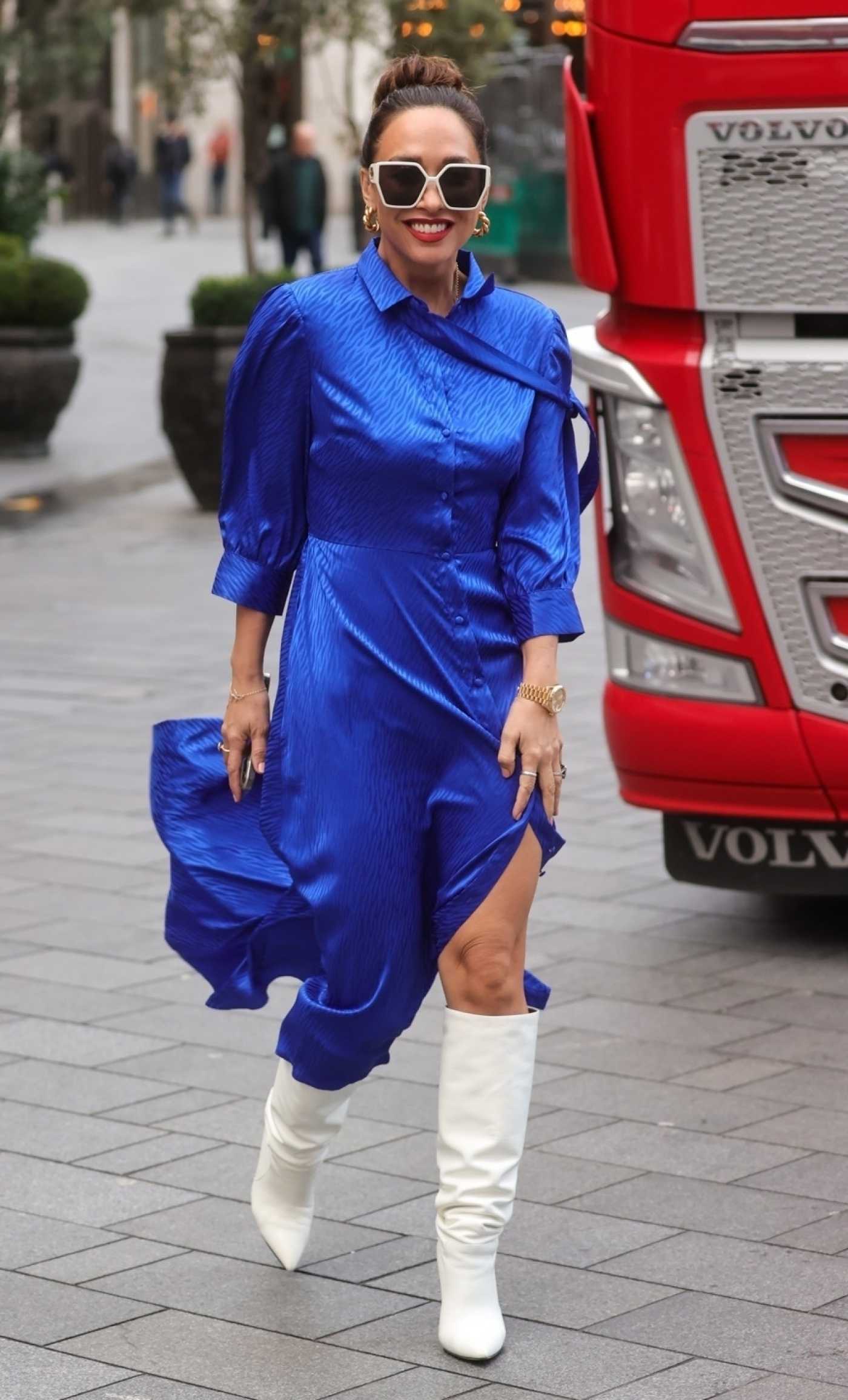 Myleene Klass in a Blue Dress Arrives at the Smooth Radio in London 11/08/2022