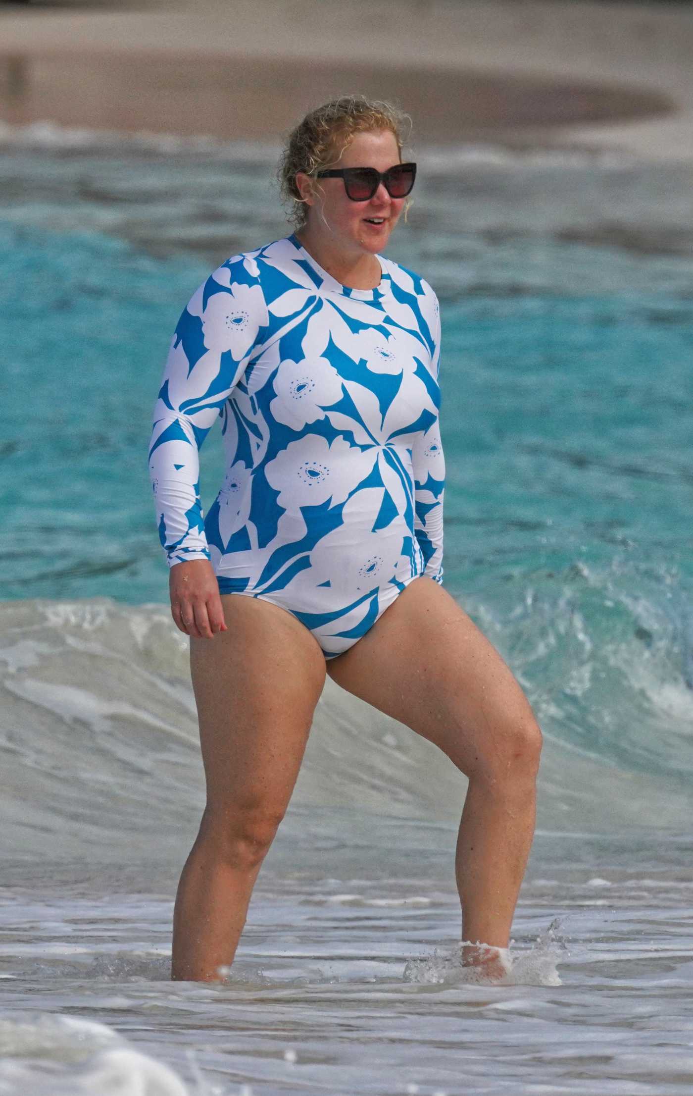 Amy Schumer in a Blue and White Swimsuit on the Beach in Saint Barts 12/27/2022