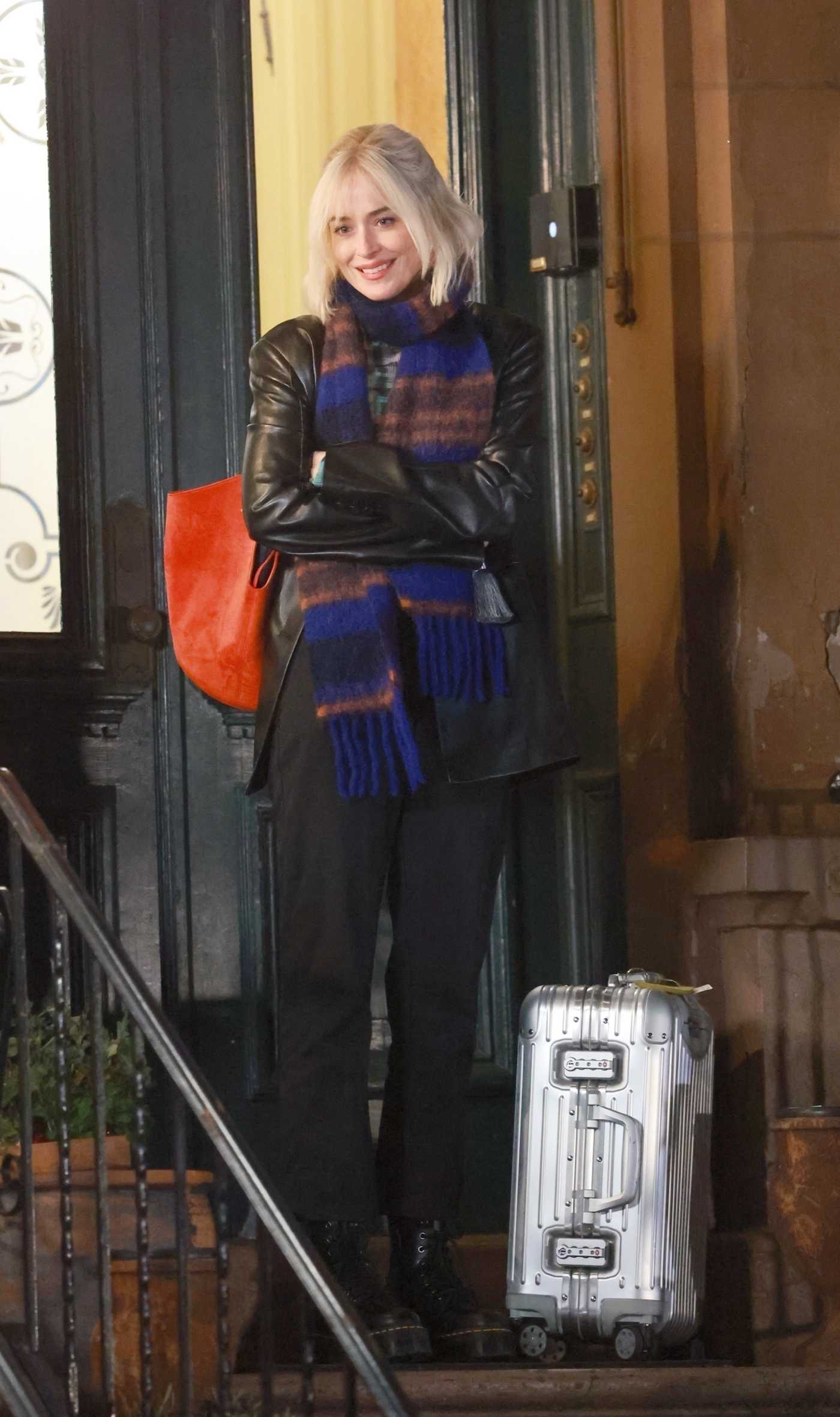 Dakota Johnson in a Black Leather Blazer Films a Night Scene for Daddio in New Jersey 12/20/2022