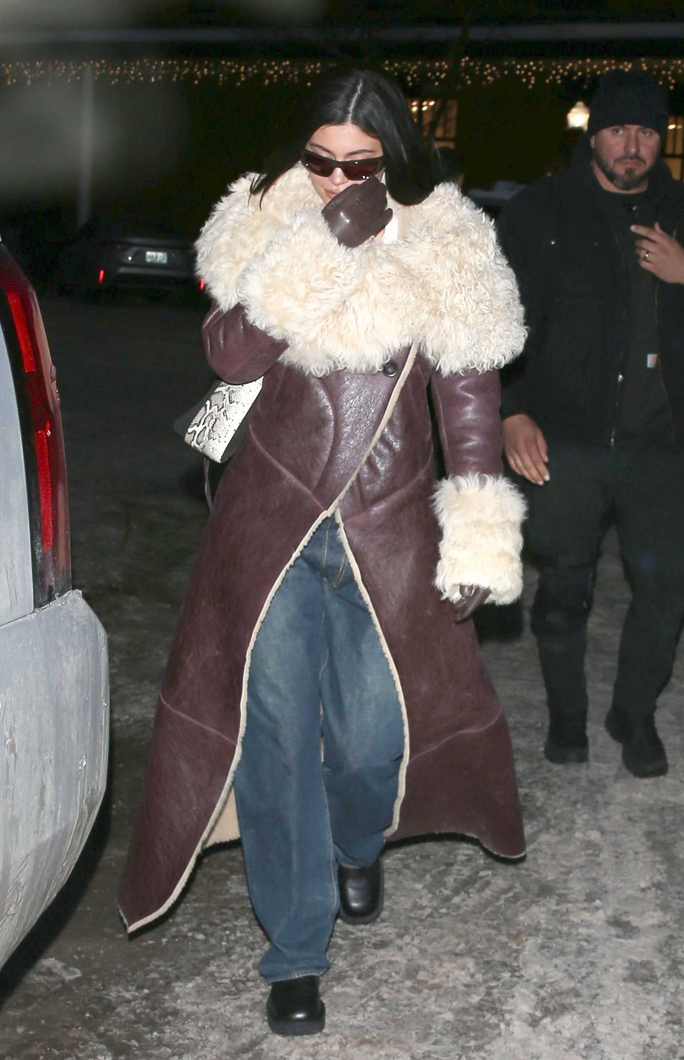 Kylie Jenner in a Brown Leather Coat Was Seen Out in Snowy Aspen 12/30/2022
