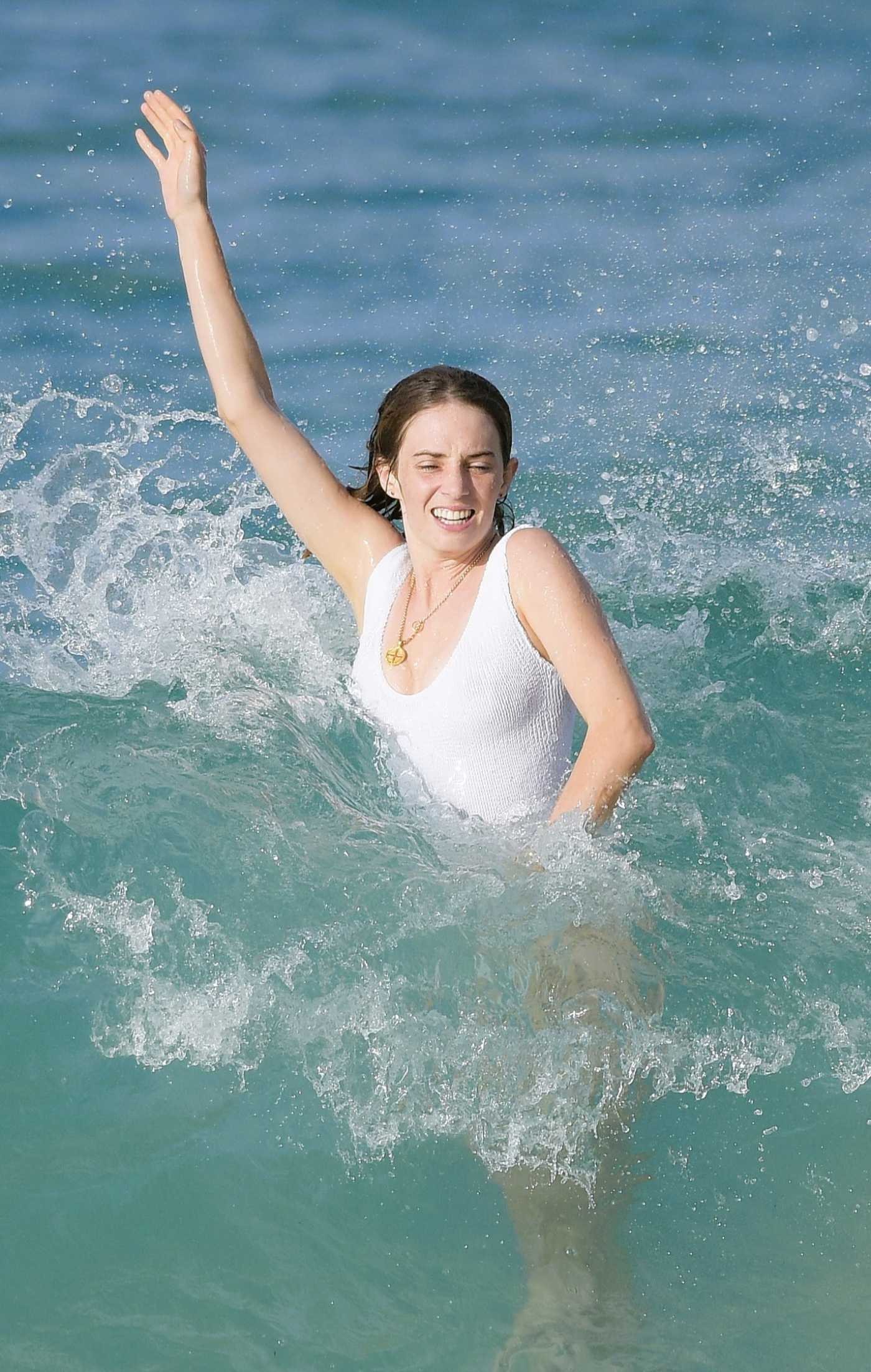 Maya Hawke in a White Swimsuit on the Beach in St. Barths 12/26/2022