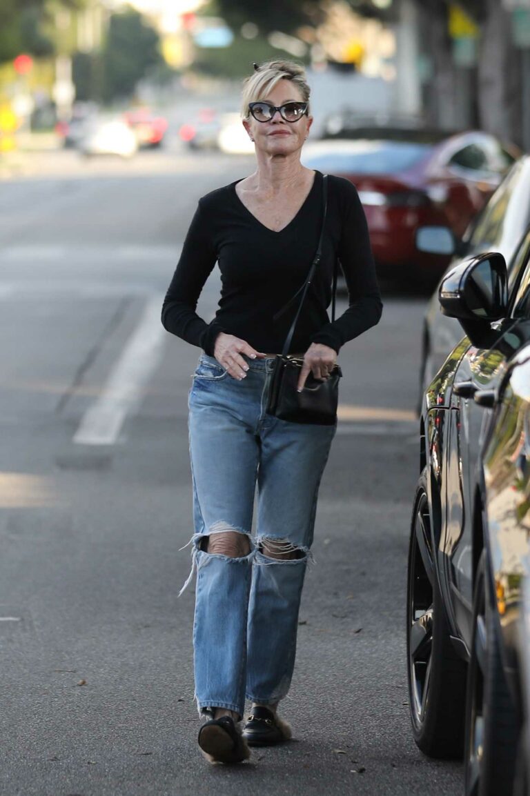Melanie Griffith in a Blue Ripped Jeans