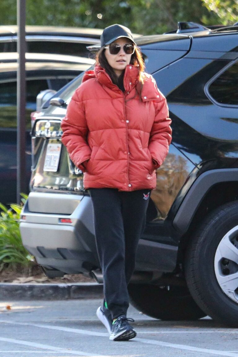 Mila Kunis in a Red Puffer Jacket