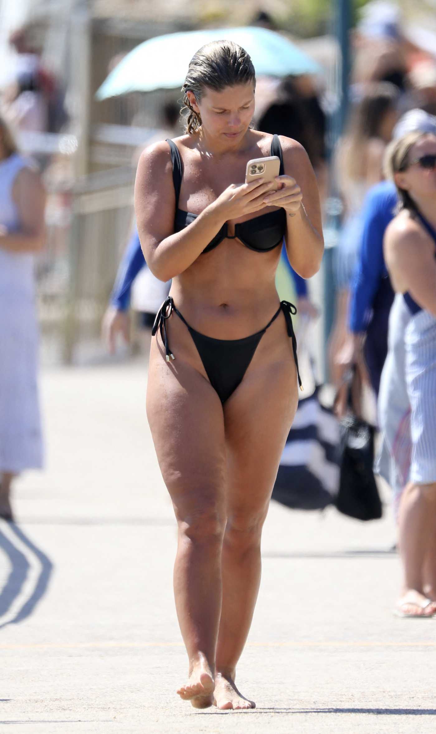 Natasha Oakley in a Black Bikini at Bronte Beach in Sydney 12/23/2022