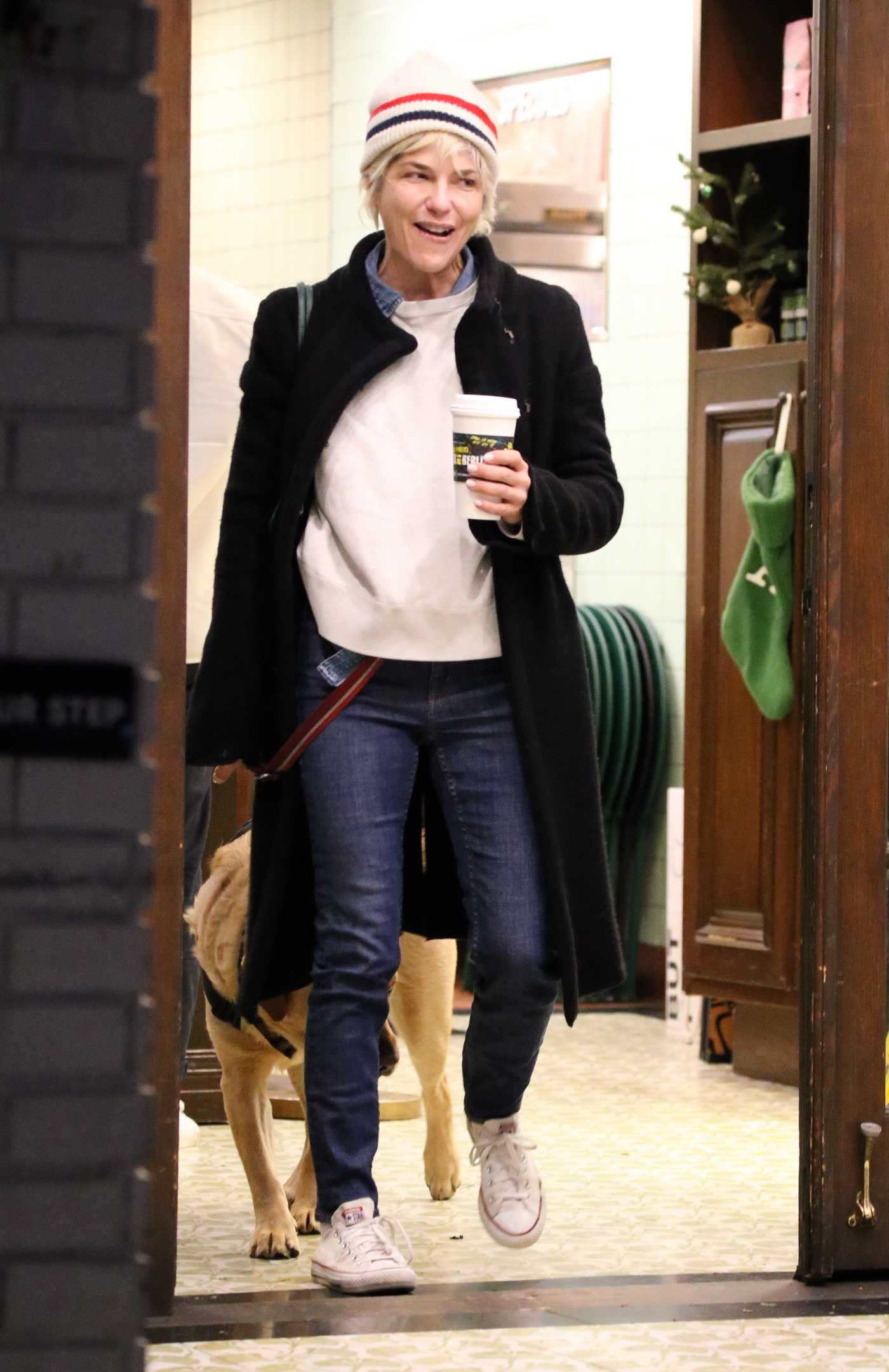 Selma Blair in a Black Coat Grabs Alfred Coffee Late with Her Service Dog Scout in Los Angeles 12/29/2022