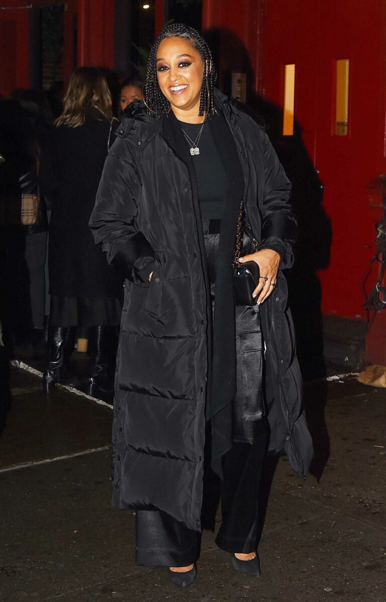 Tia Mowry in a Black Puffer Coat