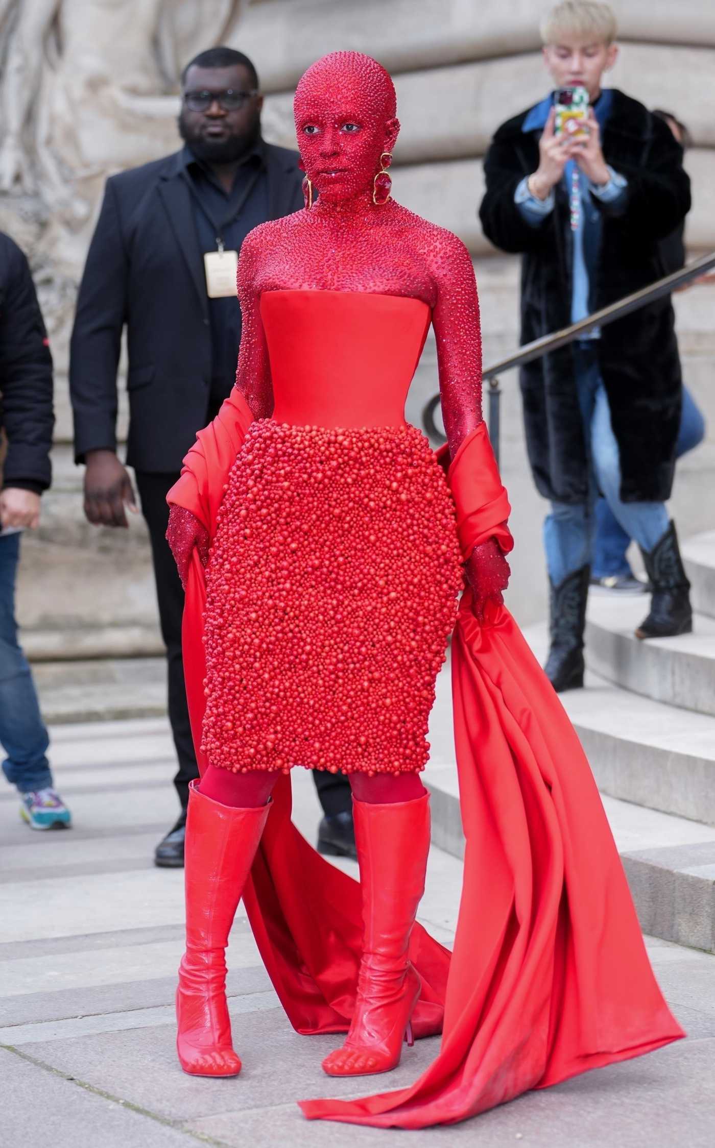 Doja Cat in a Red Ensemble Arrives at the Schiaparelli Haute Couture Fashion Show in Paris 01/23/2023