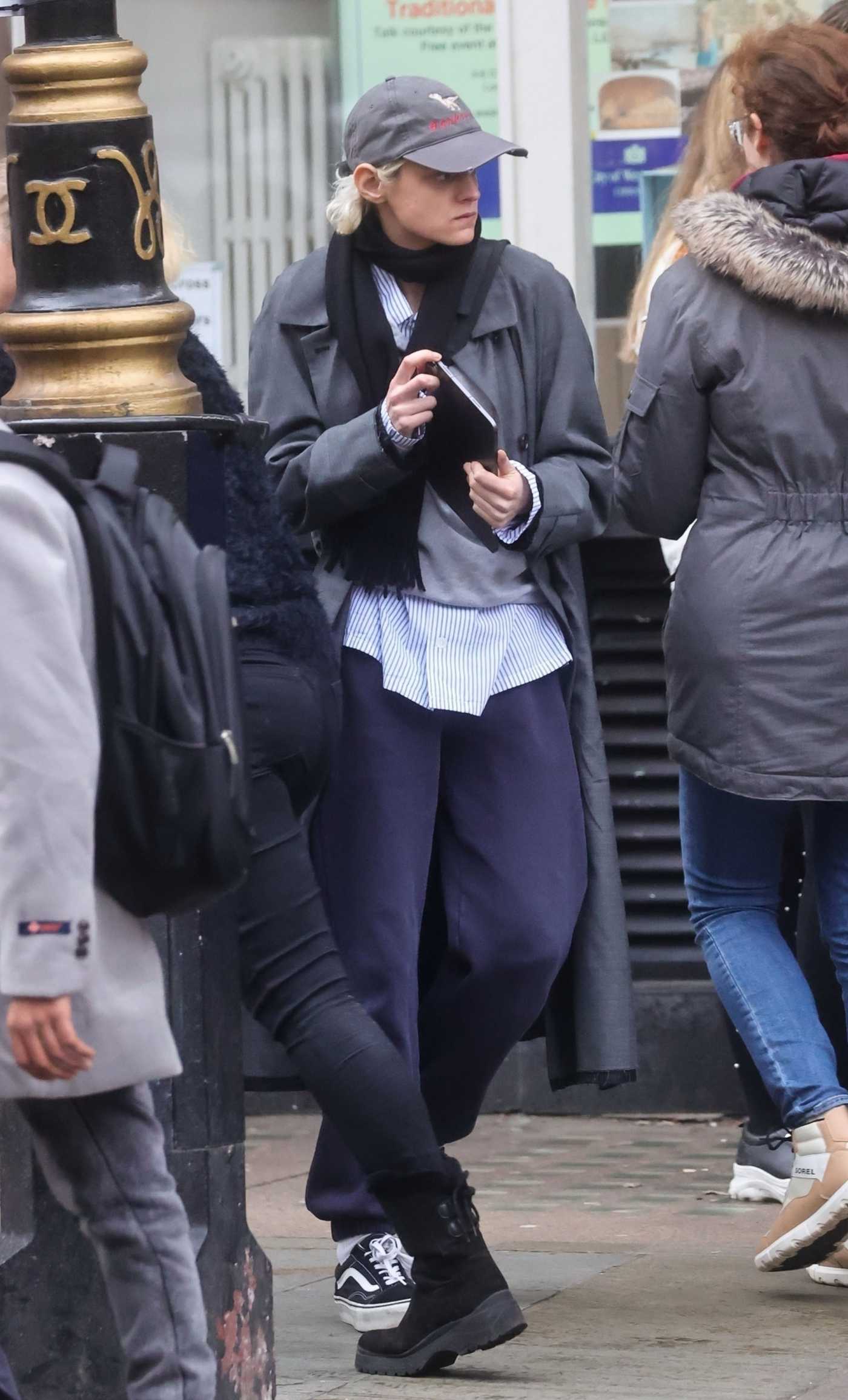 Emma Corrin in a Grey Cap Was Seen Out in Central London 01/04/2023