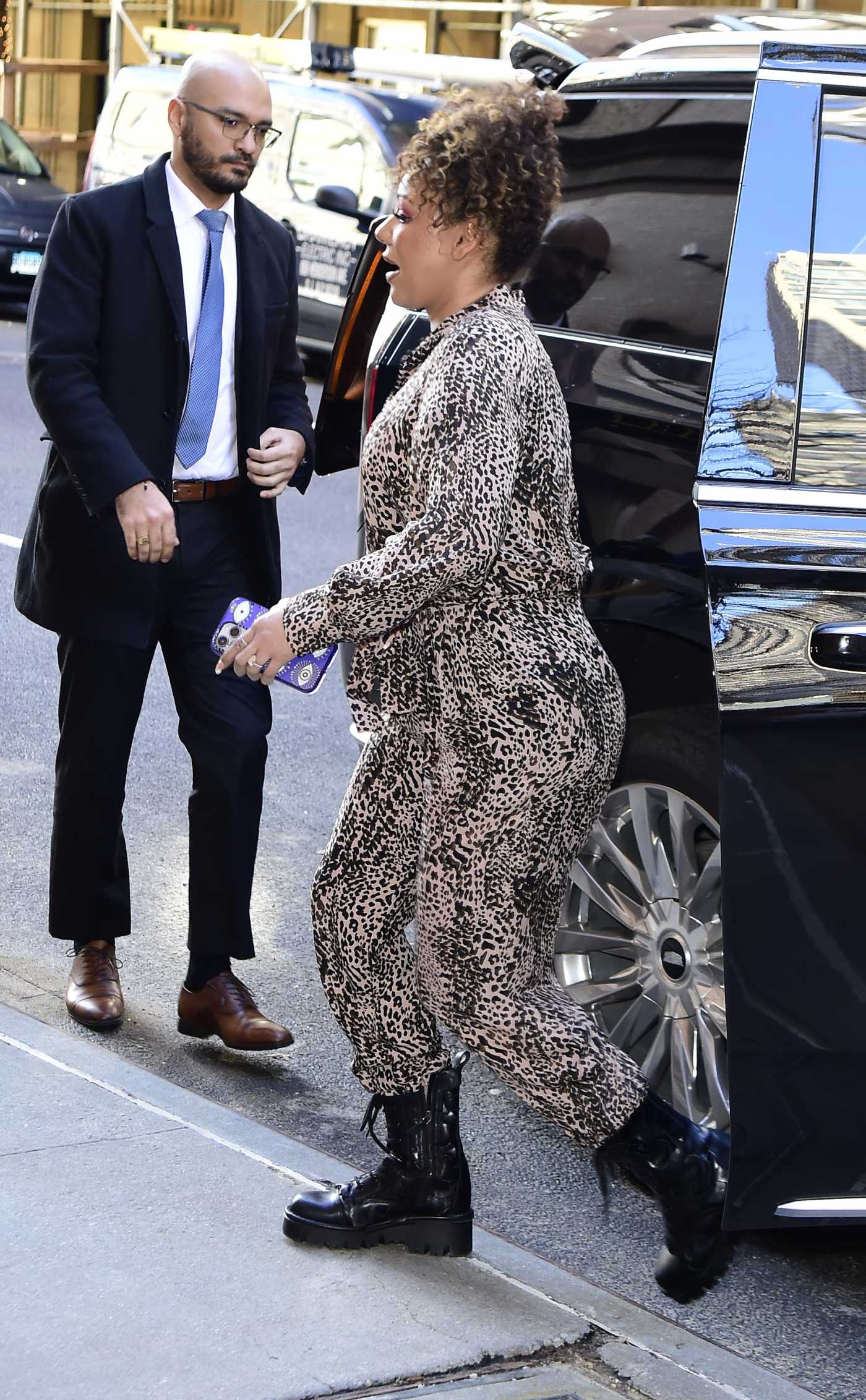 Melanie Brown in an Animal Print Jumpsuit Arrives at ABC Studios in Midtown Manhattan in NYC 01/20/2023
