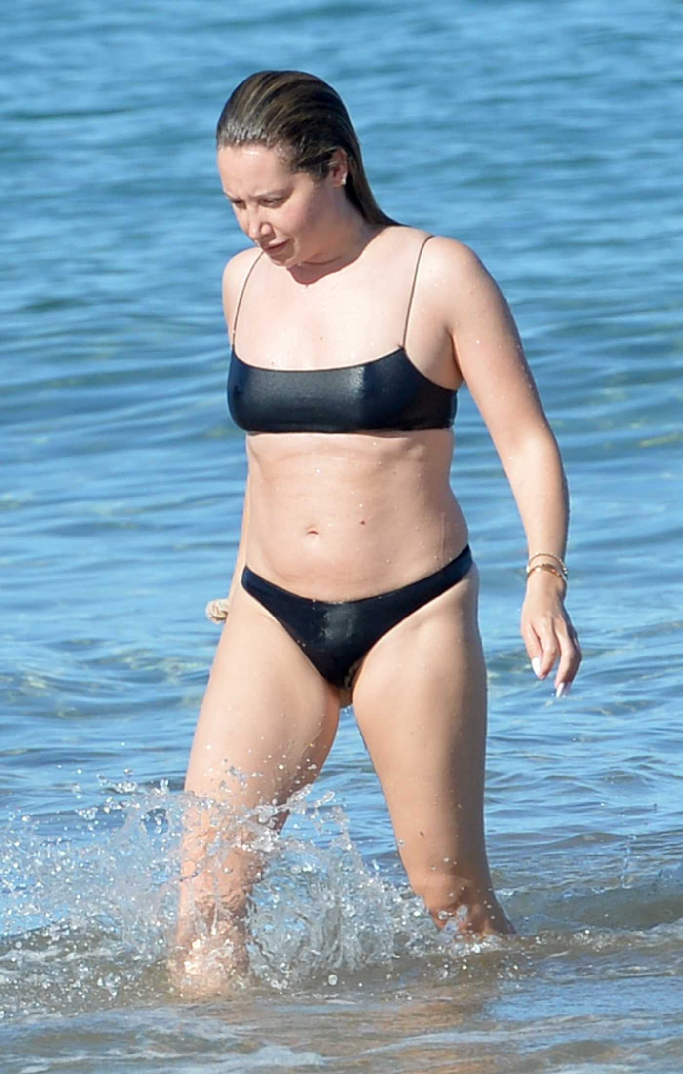 Ashley Tisdale in a Black Bikini on the Beach in Maui 02/07/2023