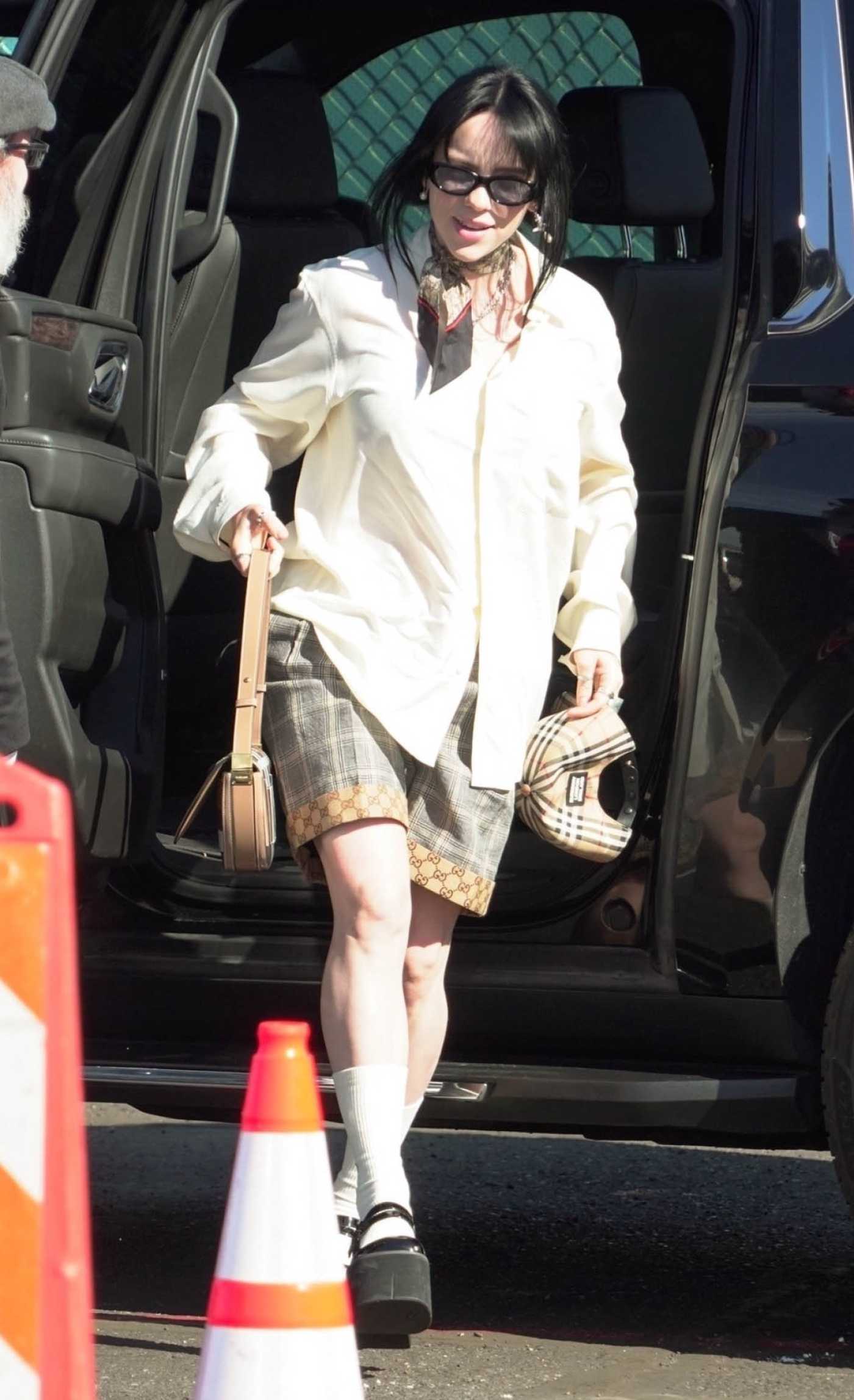 BIllie Eilish in a White Shirt Arrives at Super Bowl LVII at the State Farm Stadium in Glendale 02/12/2023
