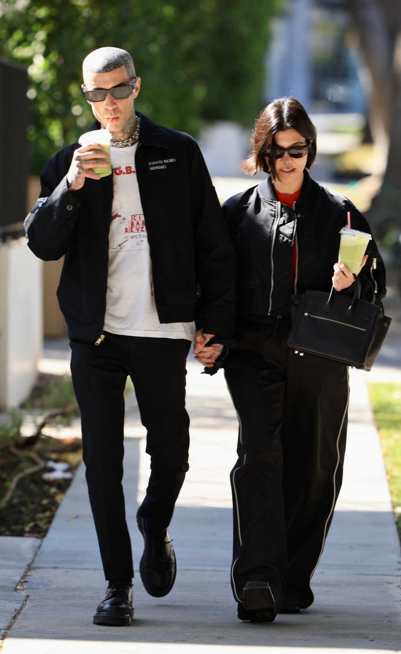 Kourtney Kardashian in a Black Bomber Jacket Was Seen Out with Travis Barker in West Hollywood 02/20/2023