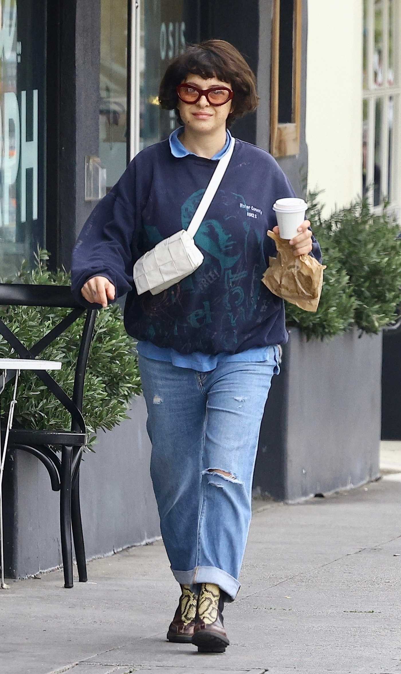Alia Shawkat in a Blue Ripped Jeans Was Seen Out in Los Feliz 03/16/2023