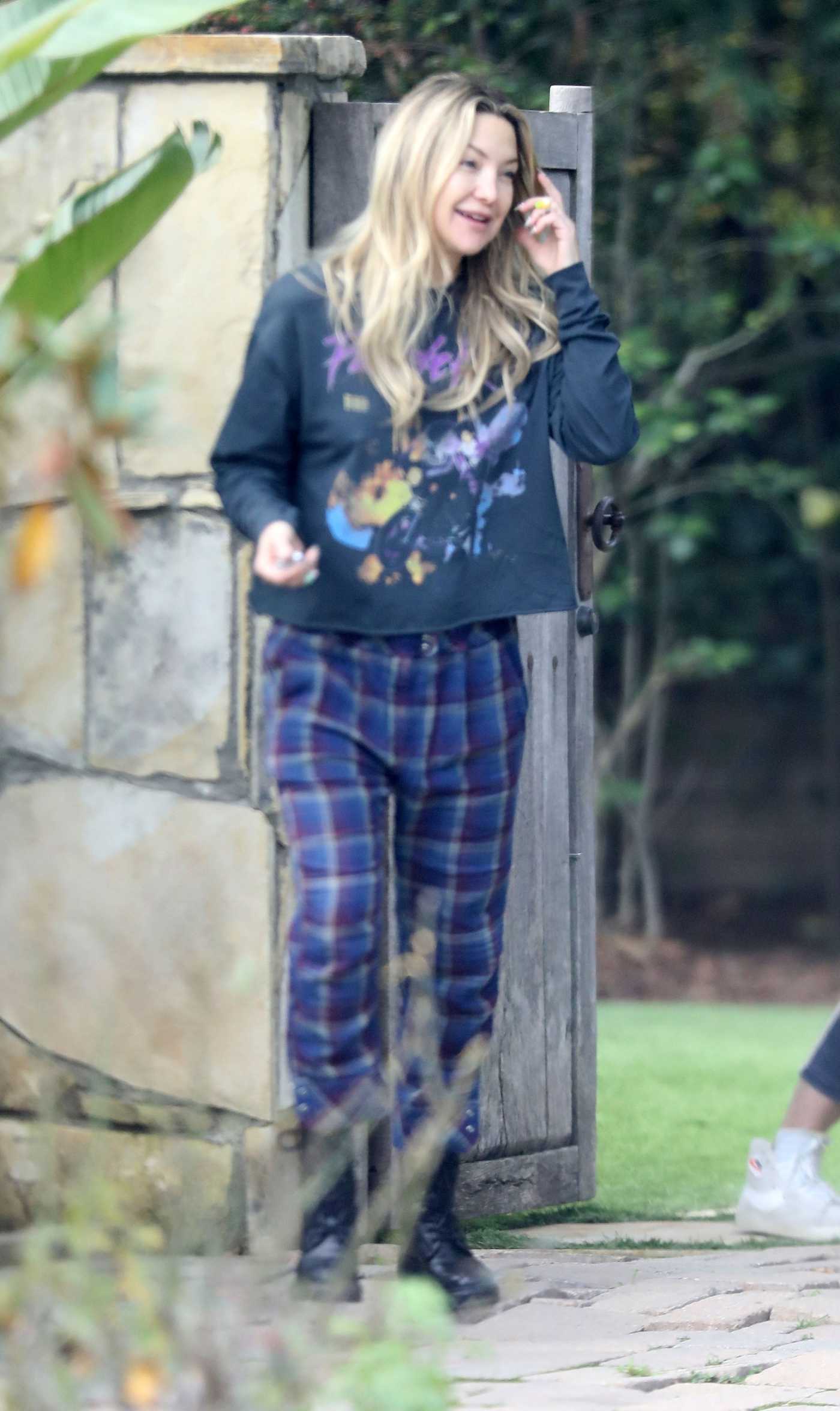Kate Hudson in a Plaid Pants Visits a Friend's House in Brentwood 03/20/2023