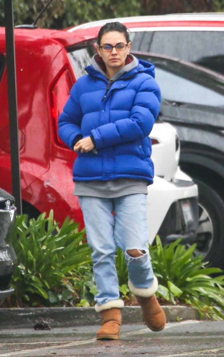 Mila Kunis in a Blue Puffer Jacket