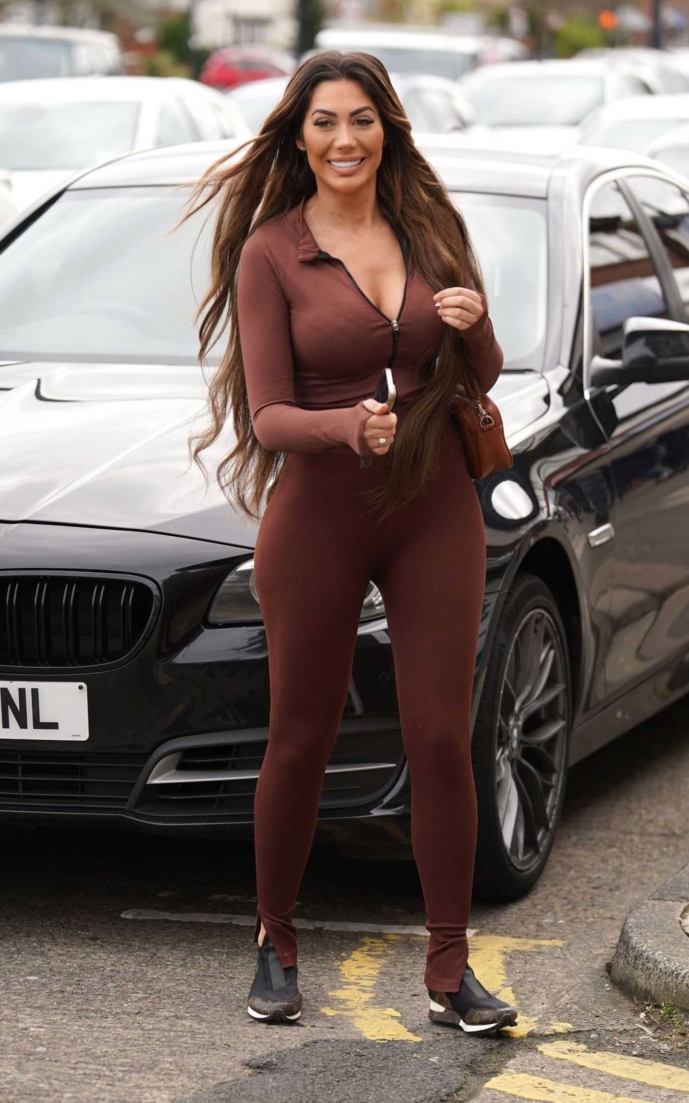 Chloe Ferry in a Brown Ensemble Heads into Her Salon in Newcastle 04/06/2023
