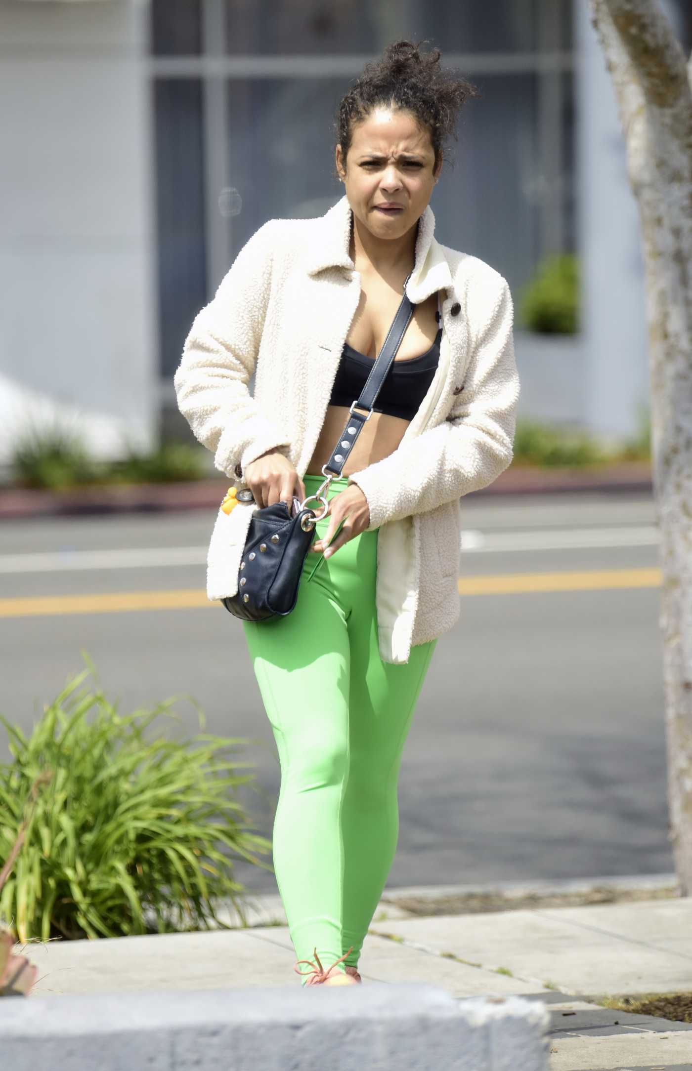 Christina Milian in a Neon Green Leggings Leaves Her Workout in Los Angeles 04/19/2023