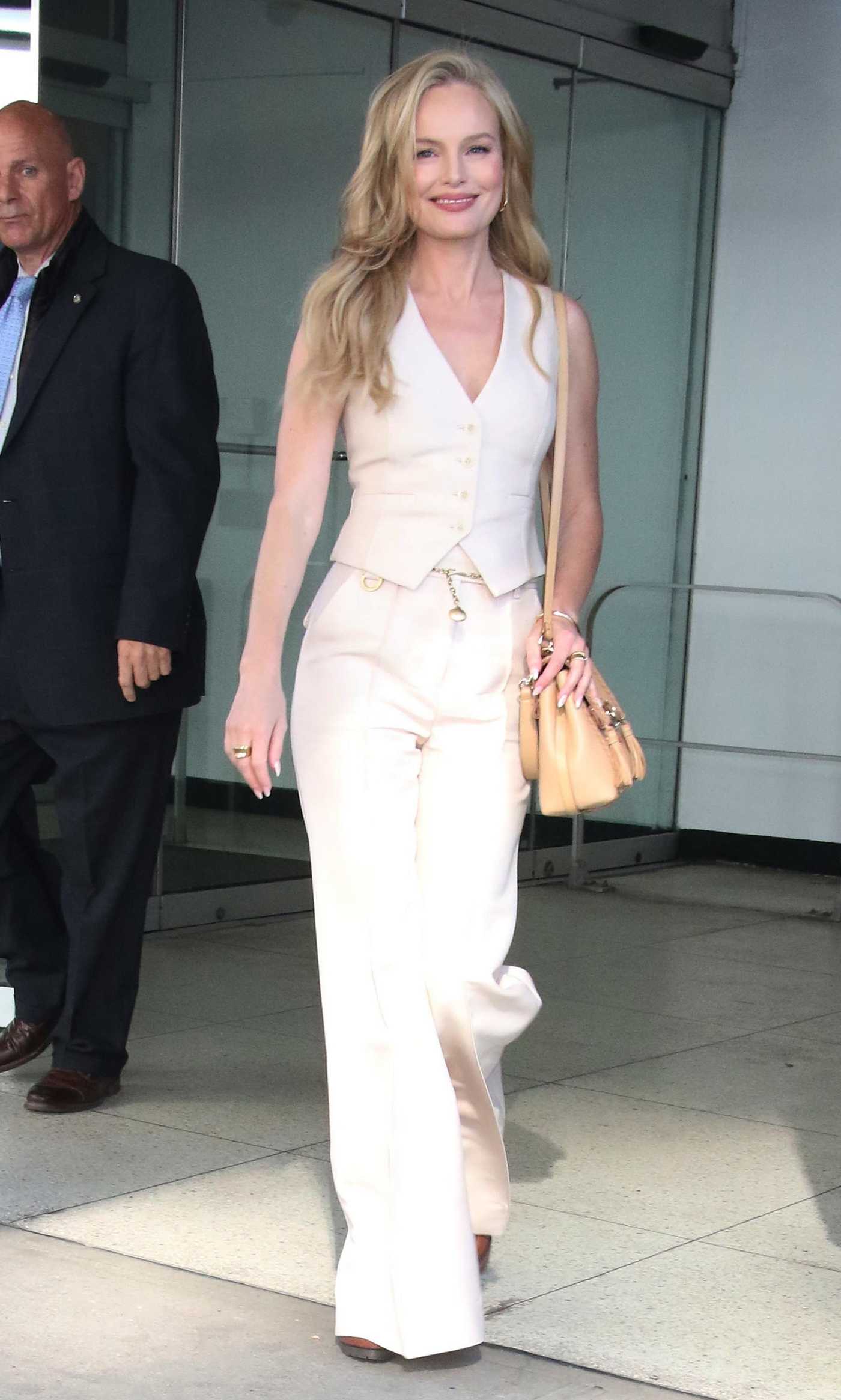 Kate Bosworth in a White Ensemble Exits The Drew Barrymore Show in New York City 03/29/2023