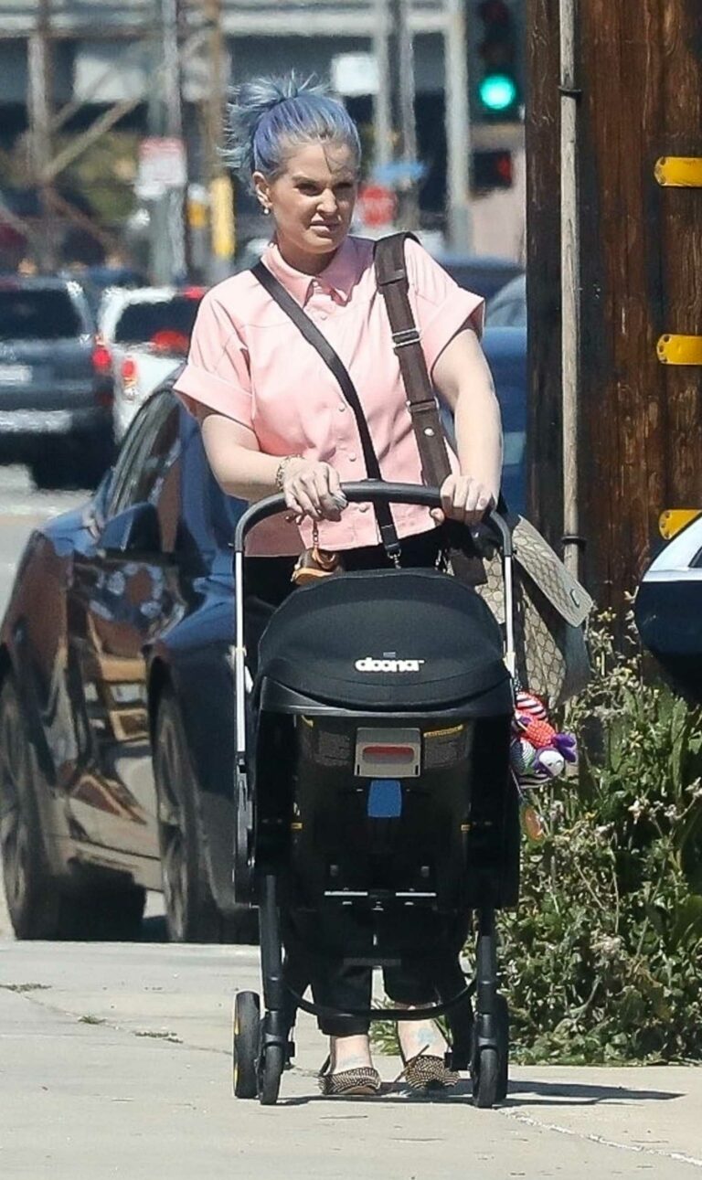 Kelly Osbourne in a Pink Shirt