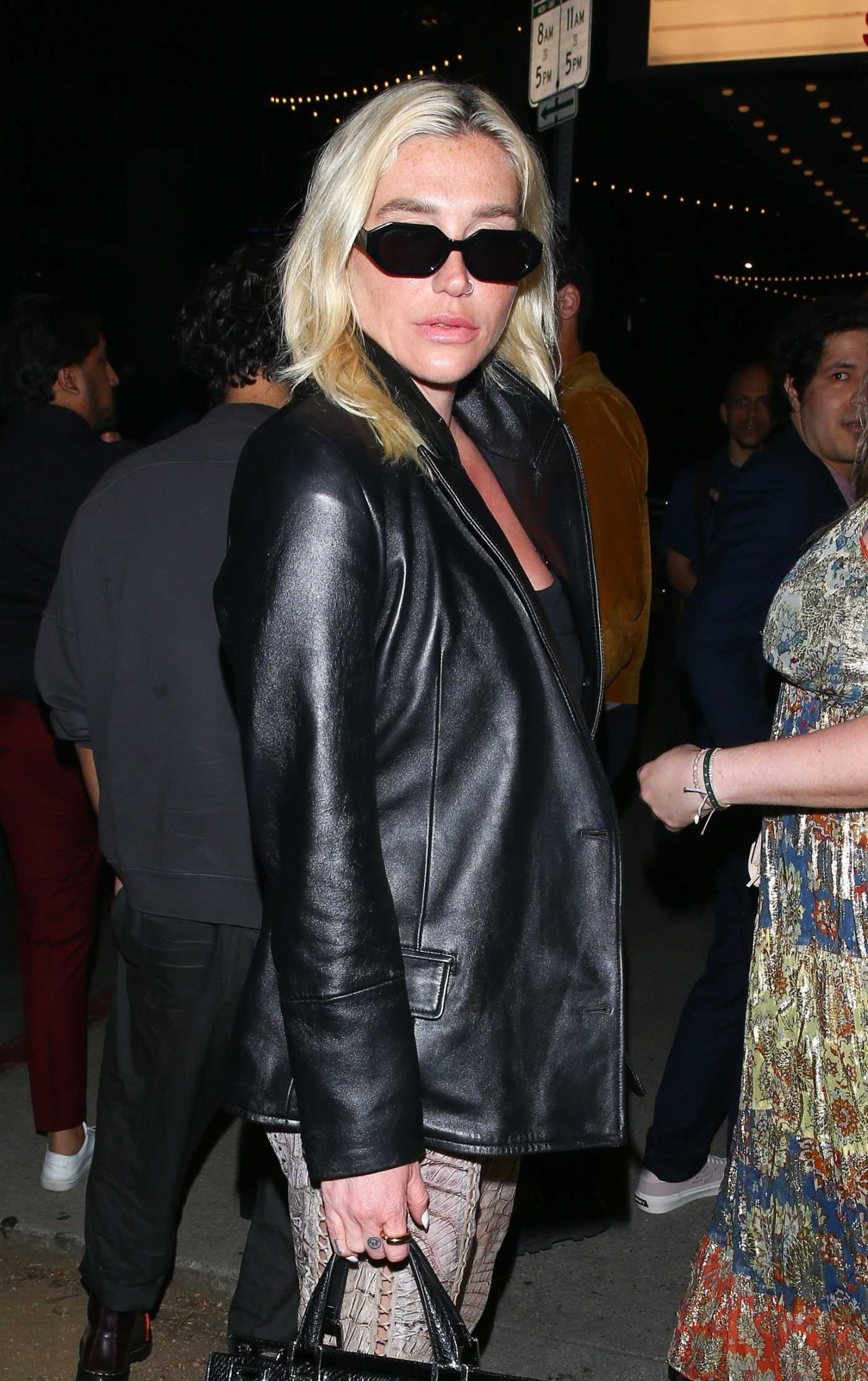 Kesha in a Black Leather Blazer Arrives at Joaquin Phoenix's Beau is Afraid After Party in Hollywood 04/10/2023