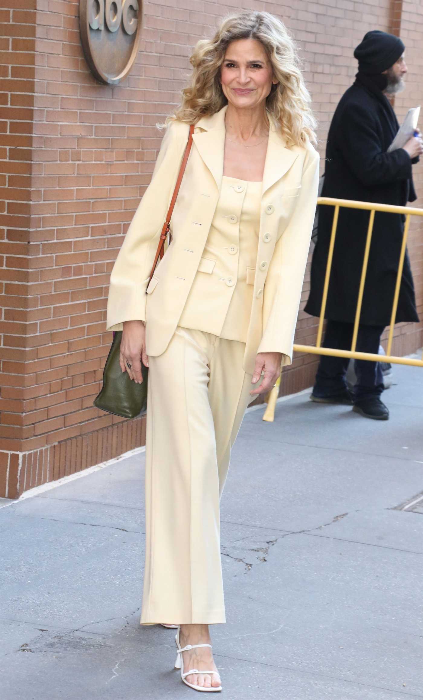 Kyra Sedgwick in a Beige Pantsuit Exits The View in New York 03/30/2023