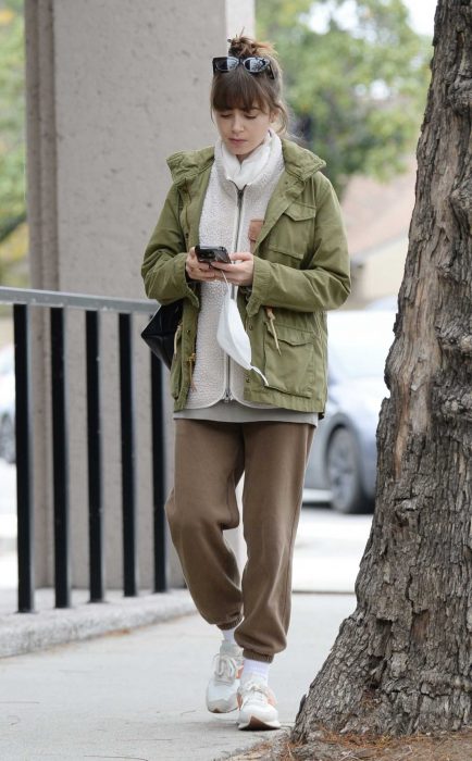 Lily Collins in an Olive Jacket
