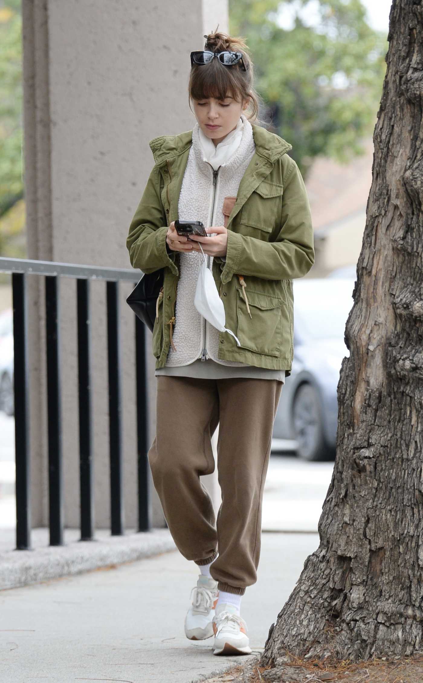 Lily Collins in an Olive Jacket Was Seen Out in Los Angeles 04/12/2023