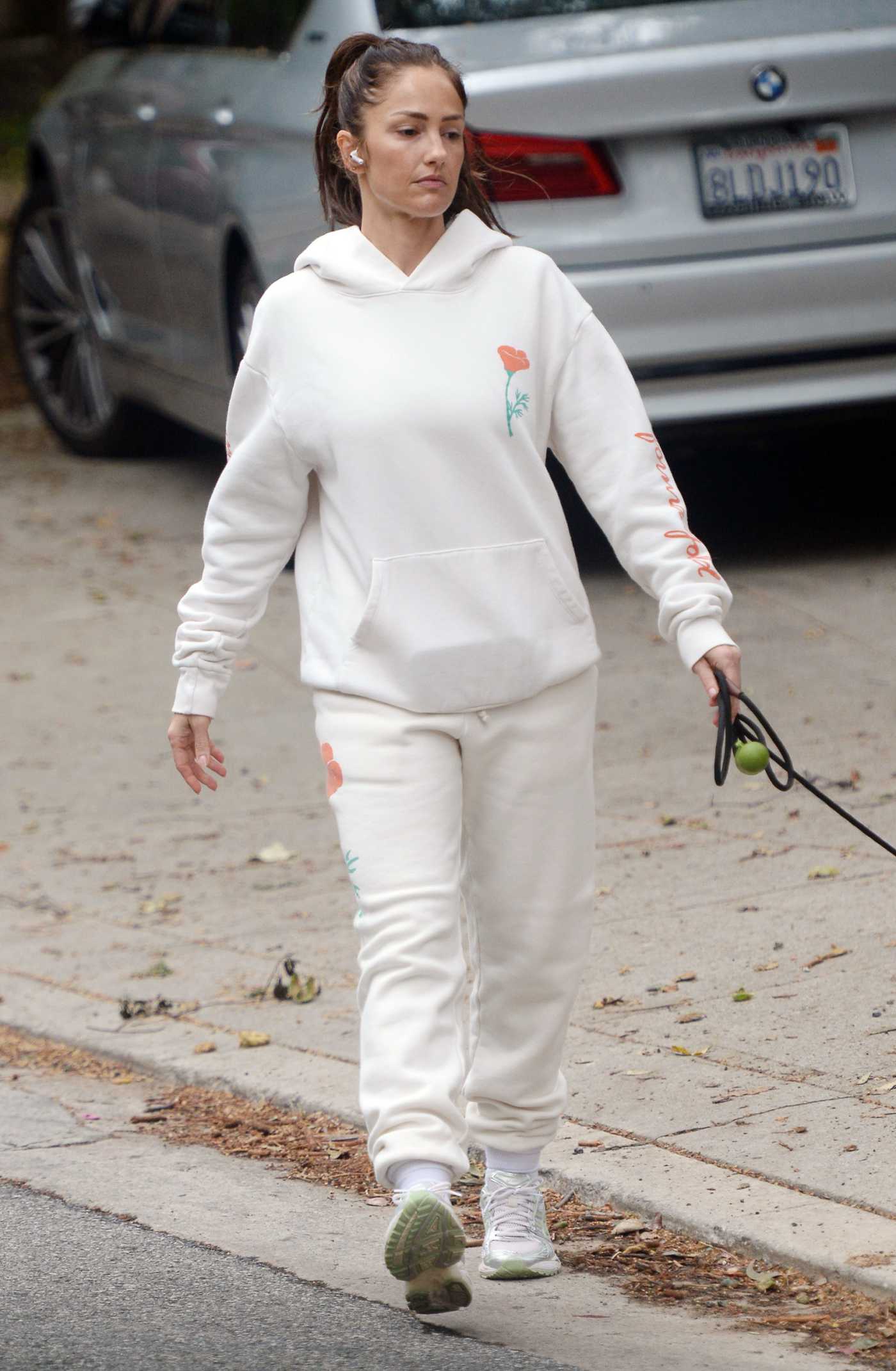 Minka Kelly in a White Sweatsuit Walks Her Dog in Los Angeles 04/13/2023