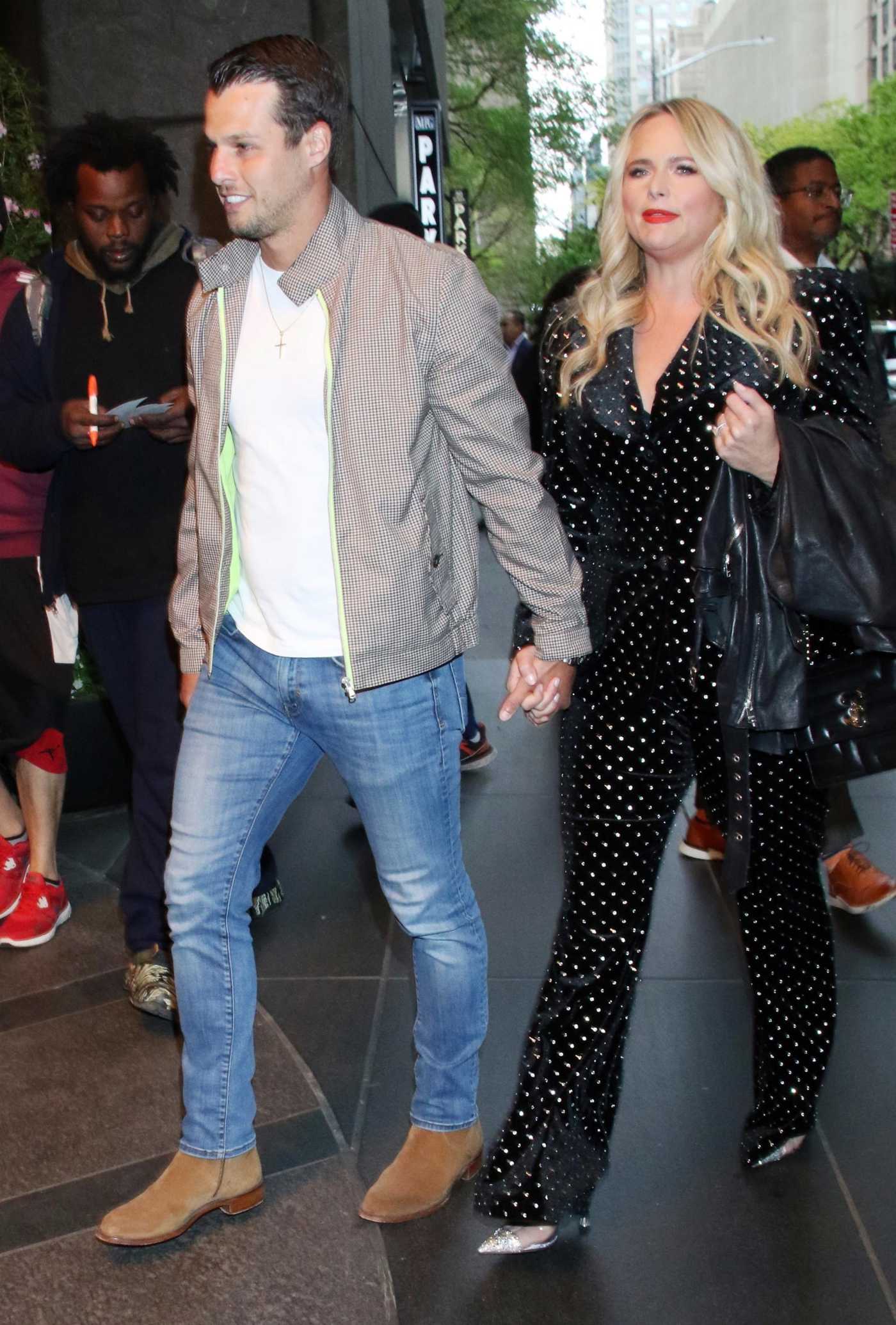 Miranda Lambert in a Black Polka Dot Dress Arrives at Her Hotel with Brendan McLoughlin in New York 04/24/2023