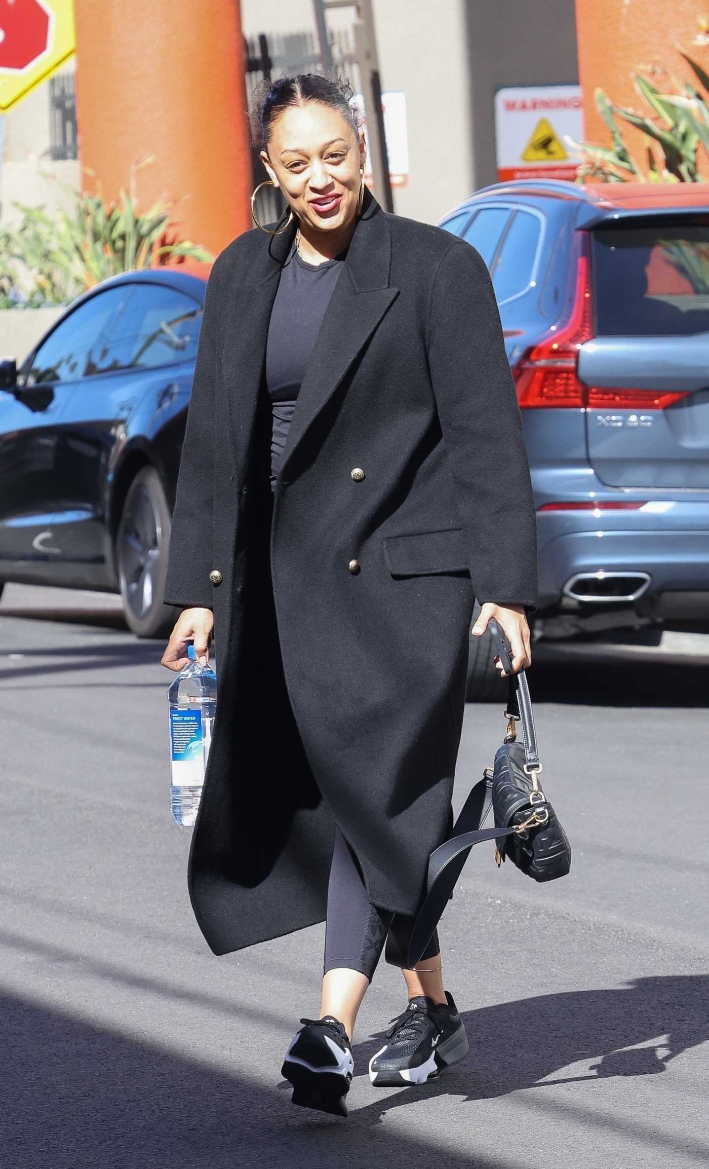Tia Mowry in a Black Coat Heads to the Gym in Studio City 04/01/2023