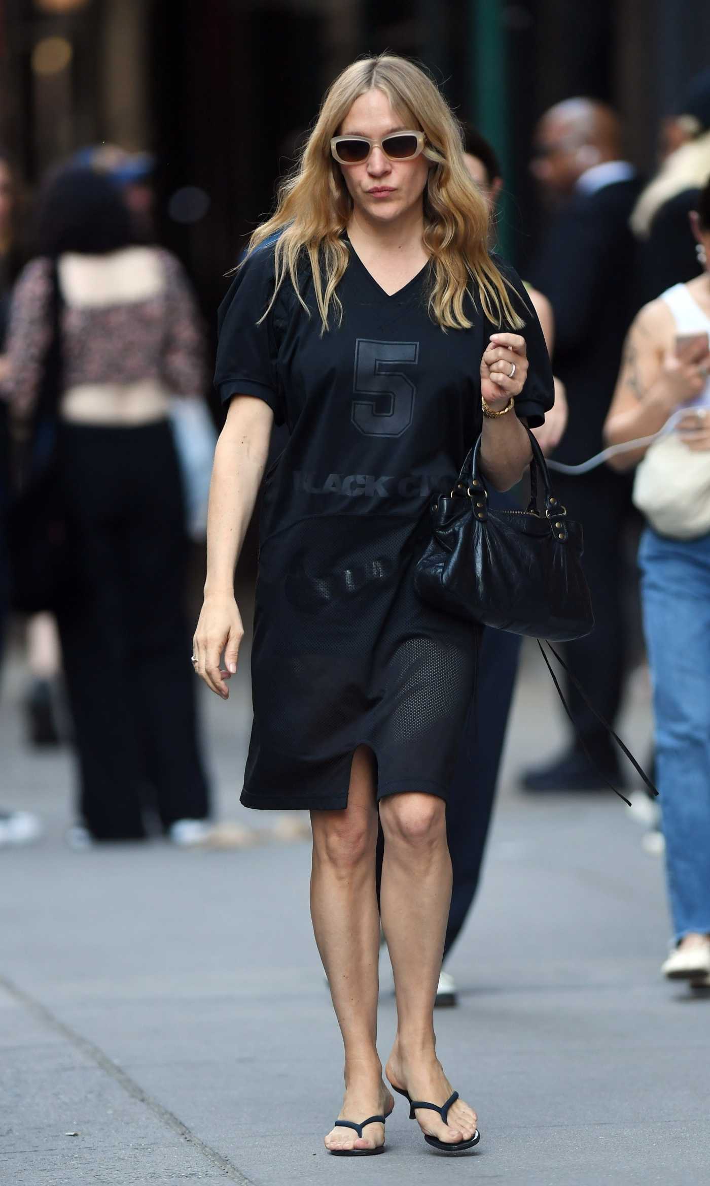 Chloe Sevigny in a Black Dress Was Seen Out in New York 05/14/2023