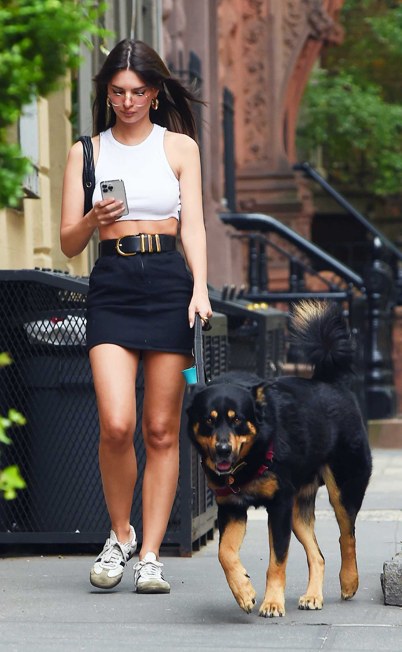 Emily Ratajkowski in a White Top Walks Her Dog in New York 05/22/2023