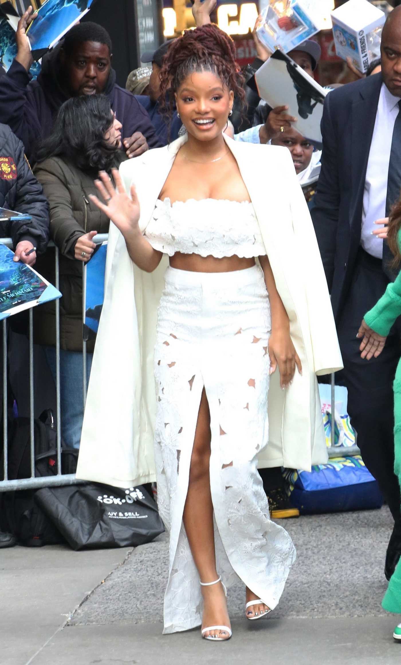 Halle Bailey In A White Trench Coat Arrives At Good Morning America In