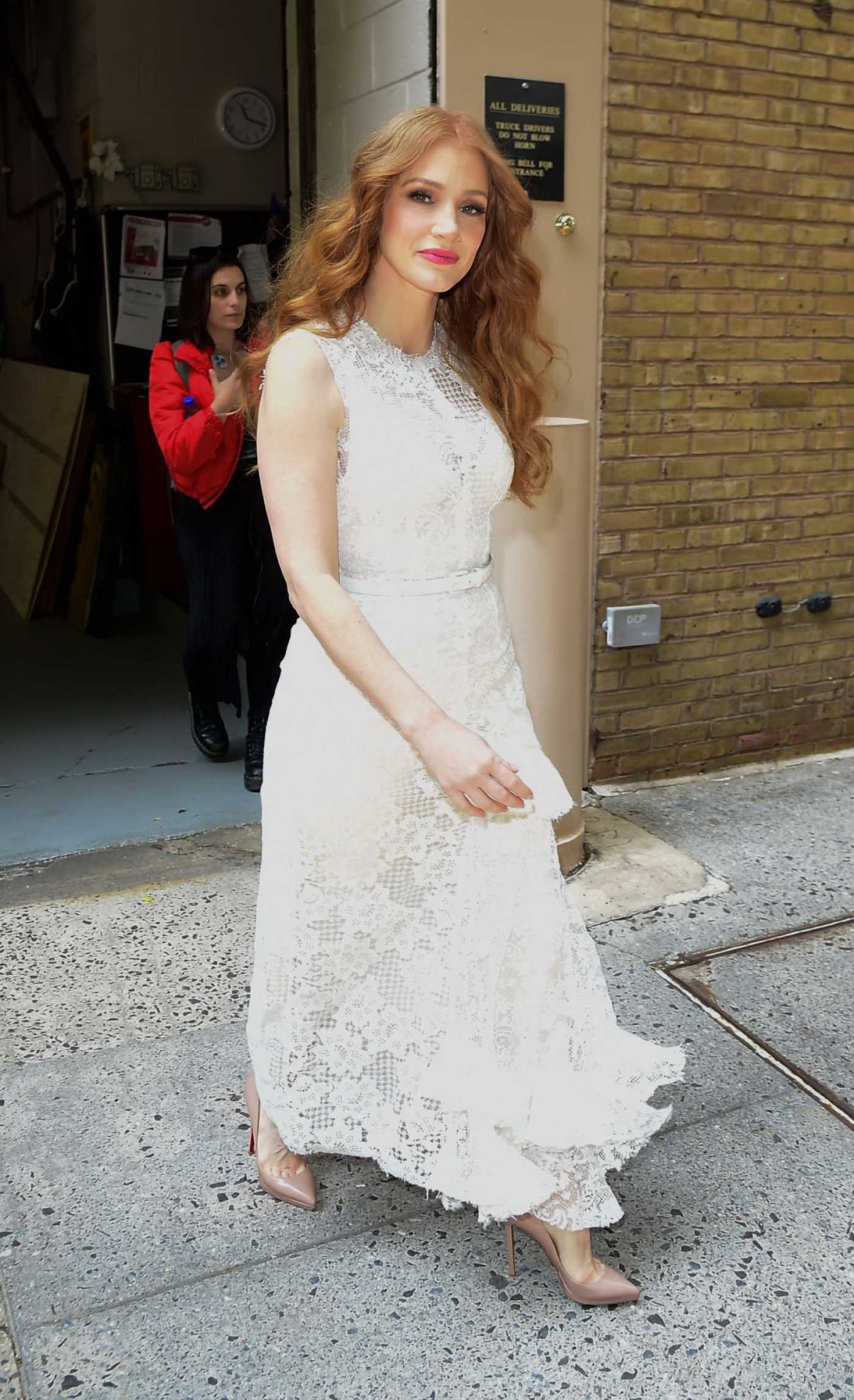 Jessica Chastain in a White Dress Arrives at the LIVE with Kelly and Mark Show in NYC 05/22/2023