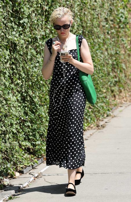 Julia Garner in a Black Polka Dot Dress